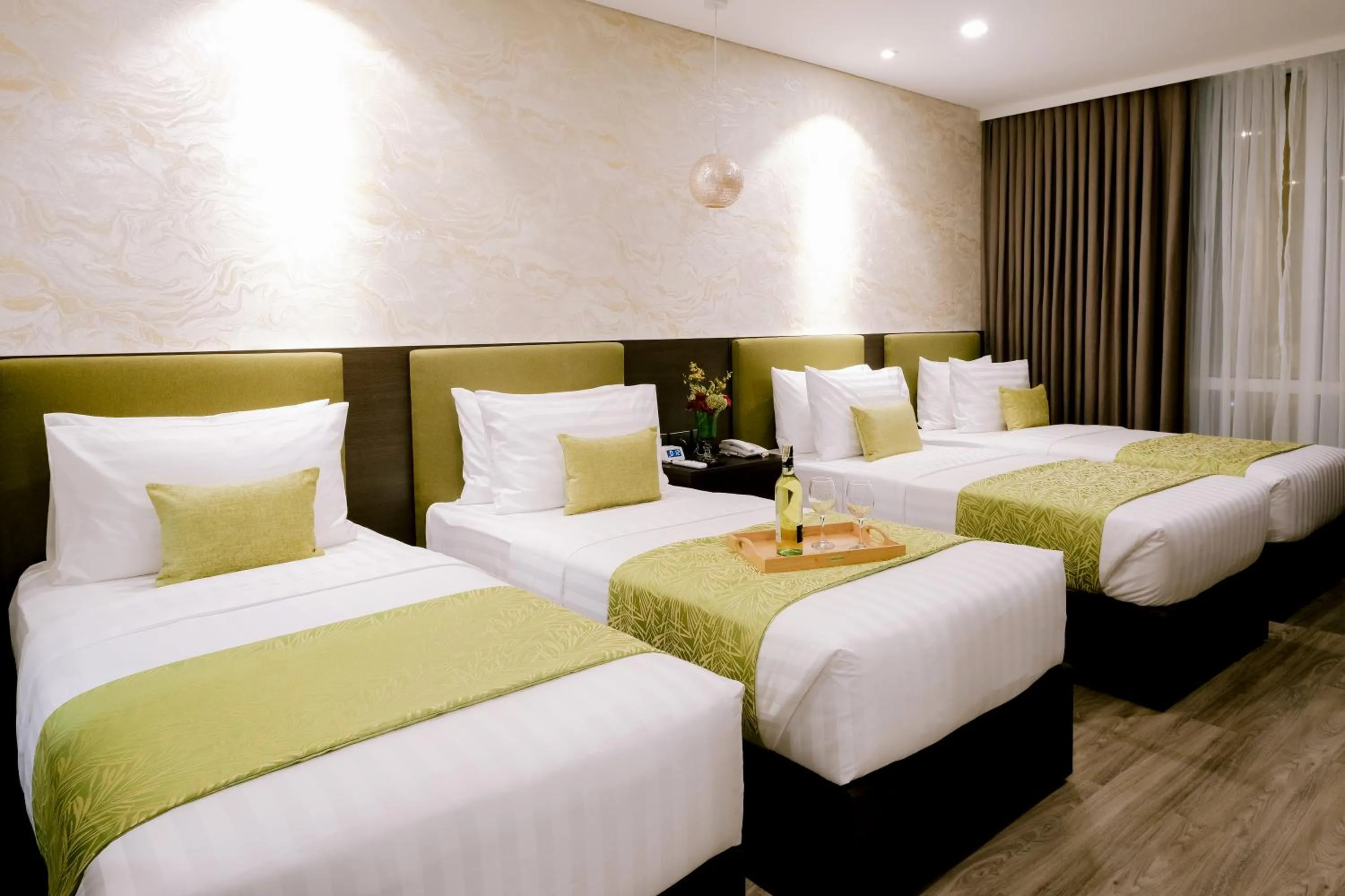 Bed in Goldberry Suites and Hotel Cebu