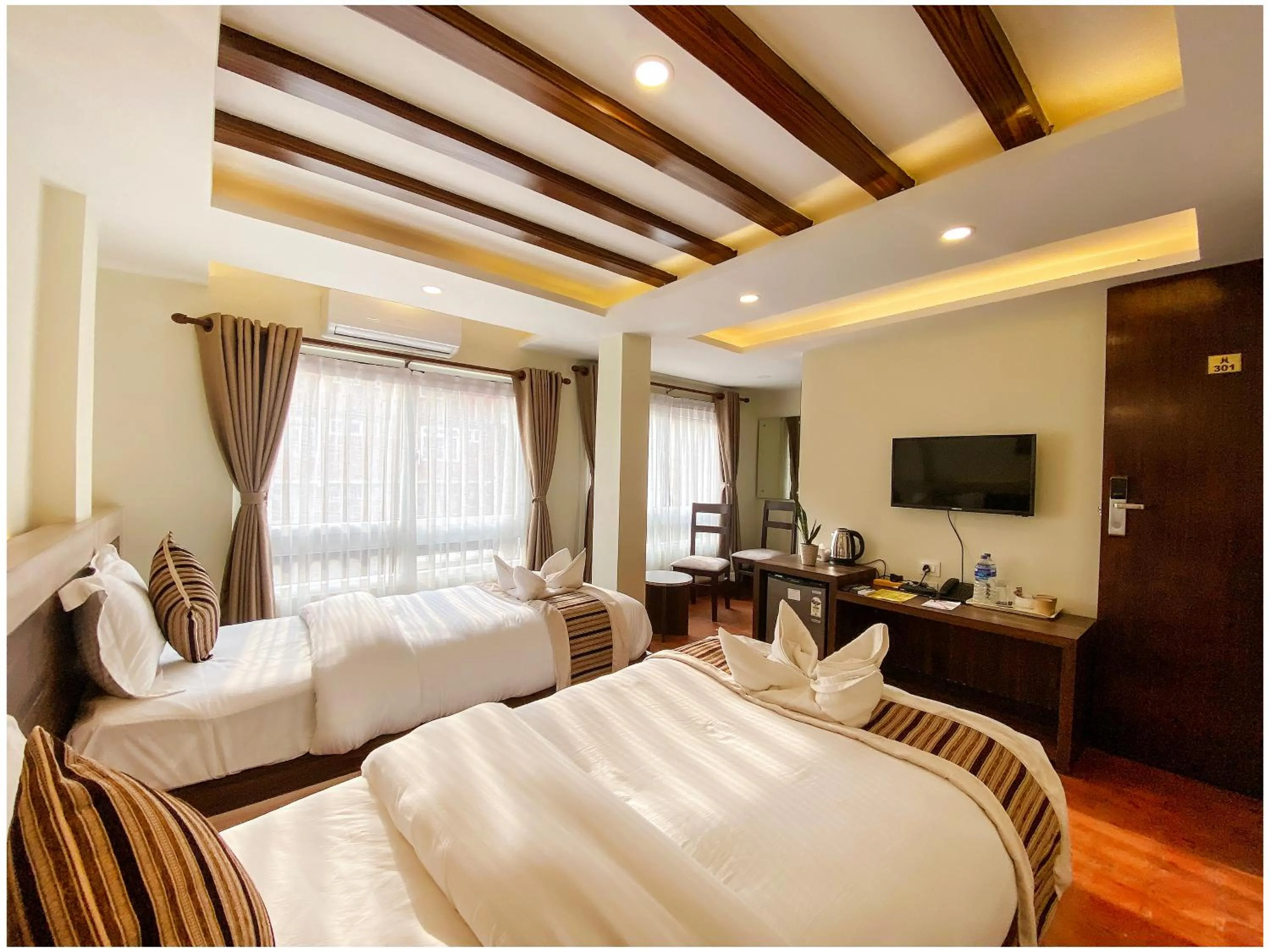 TV and multimedia, Bed in Satkar Boutique Home