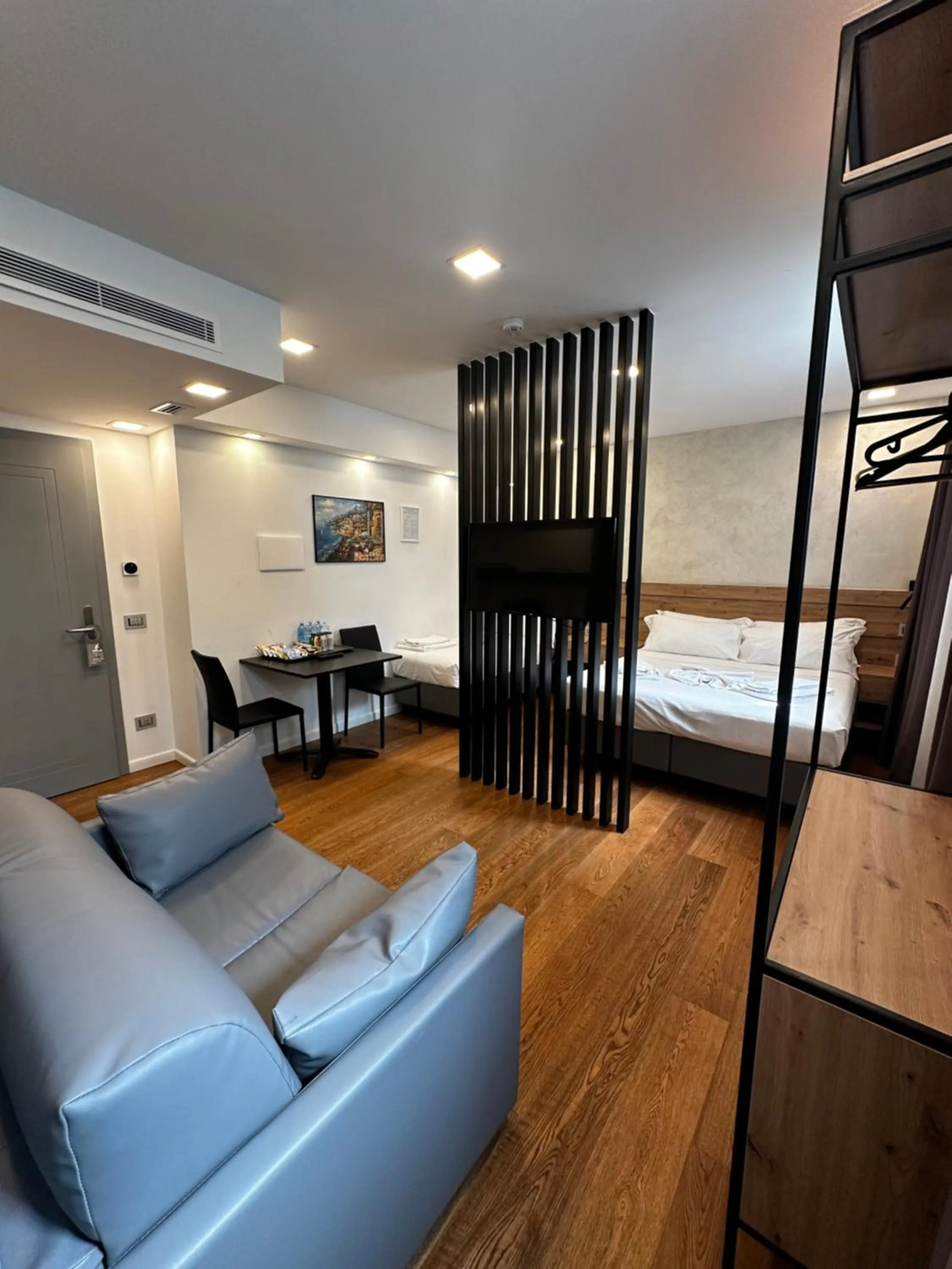 Living room, Bed in GRANDI 32 Boutique Residence