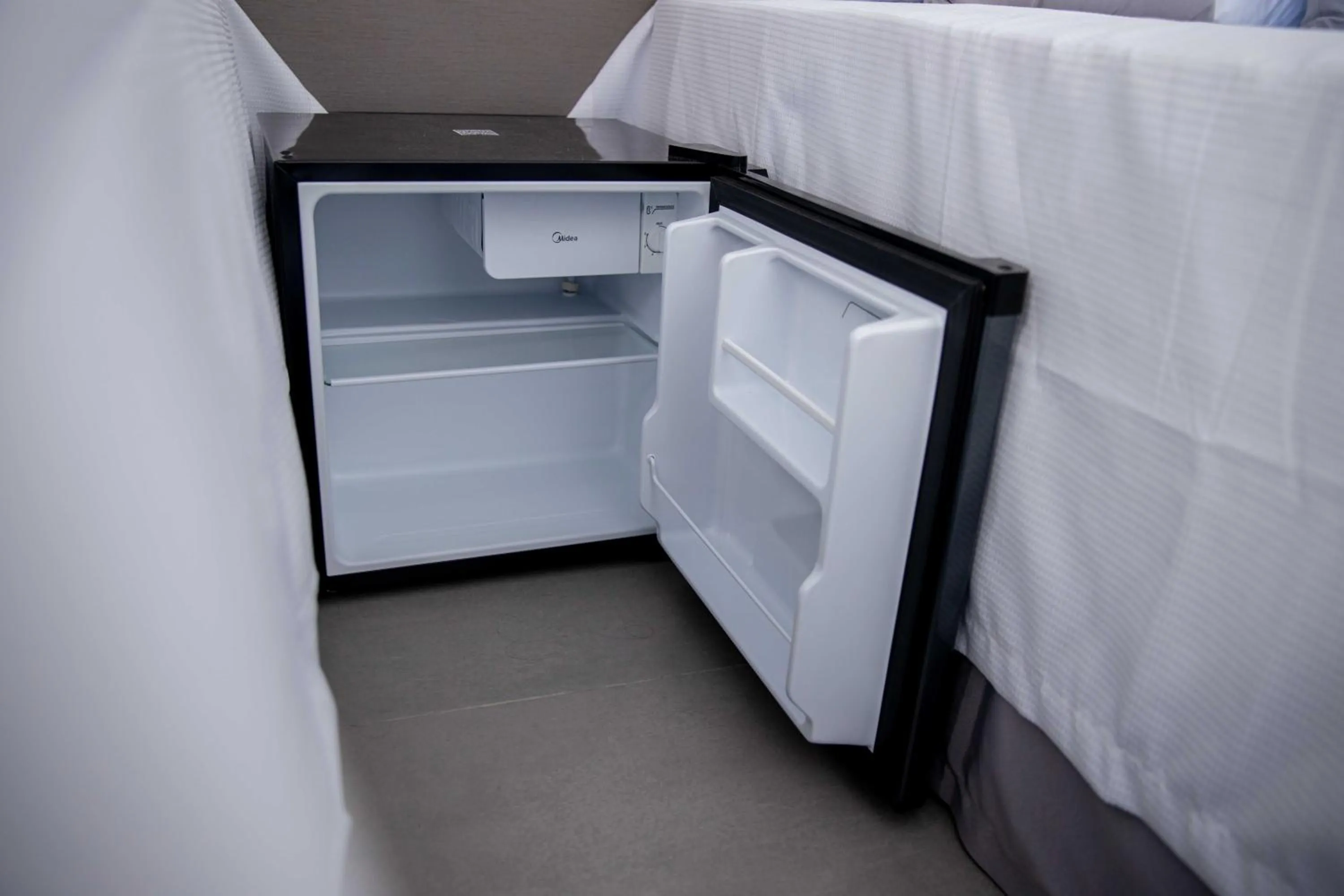 oven, Bed in Pousada Cadiz - Piscina Climatizada