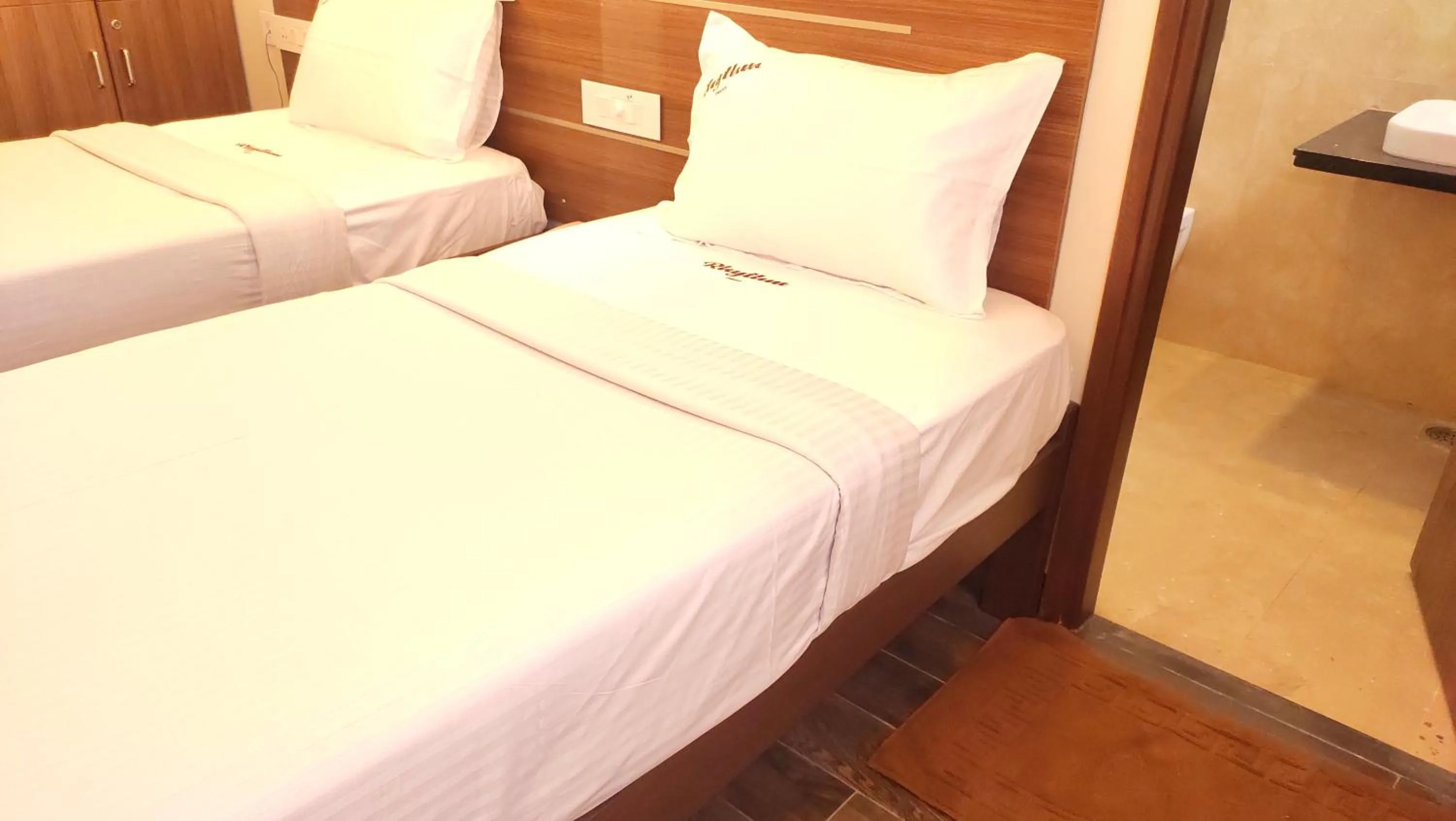 Bed in Hotel Rhythm Grand Suite