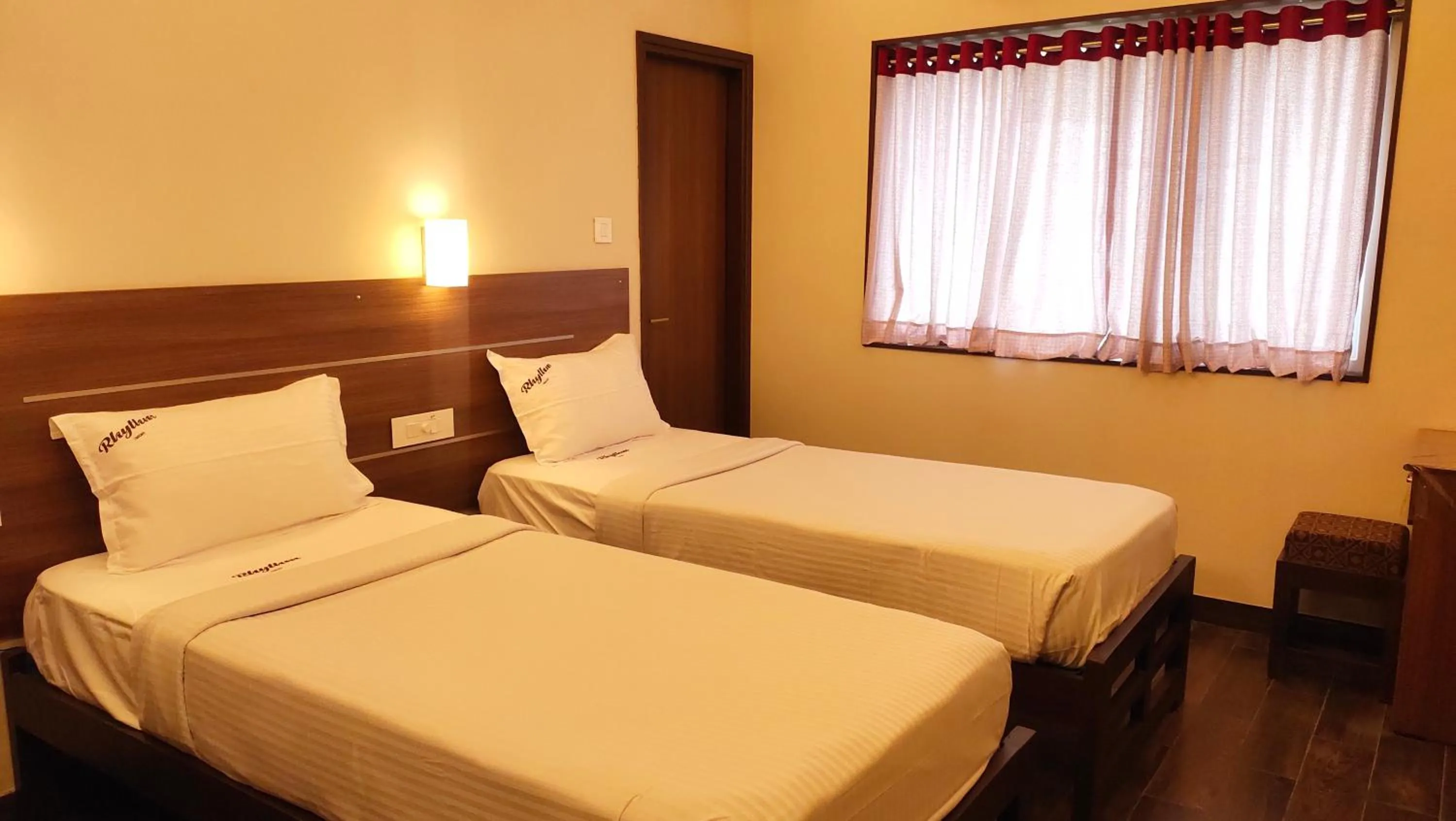 Bed in Hotel Rhythm Grand Suite