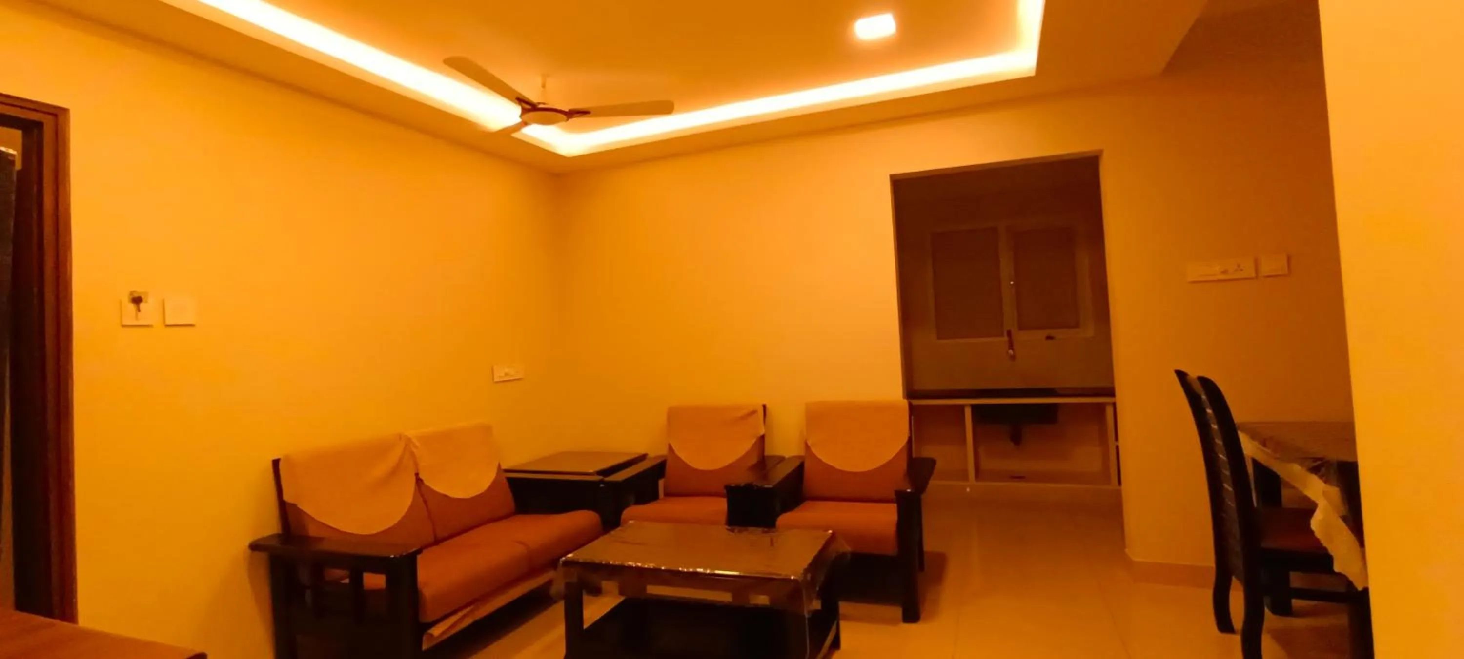 Living room in Hotel Rhythm Grand Suite