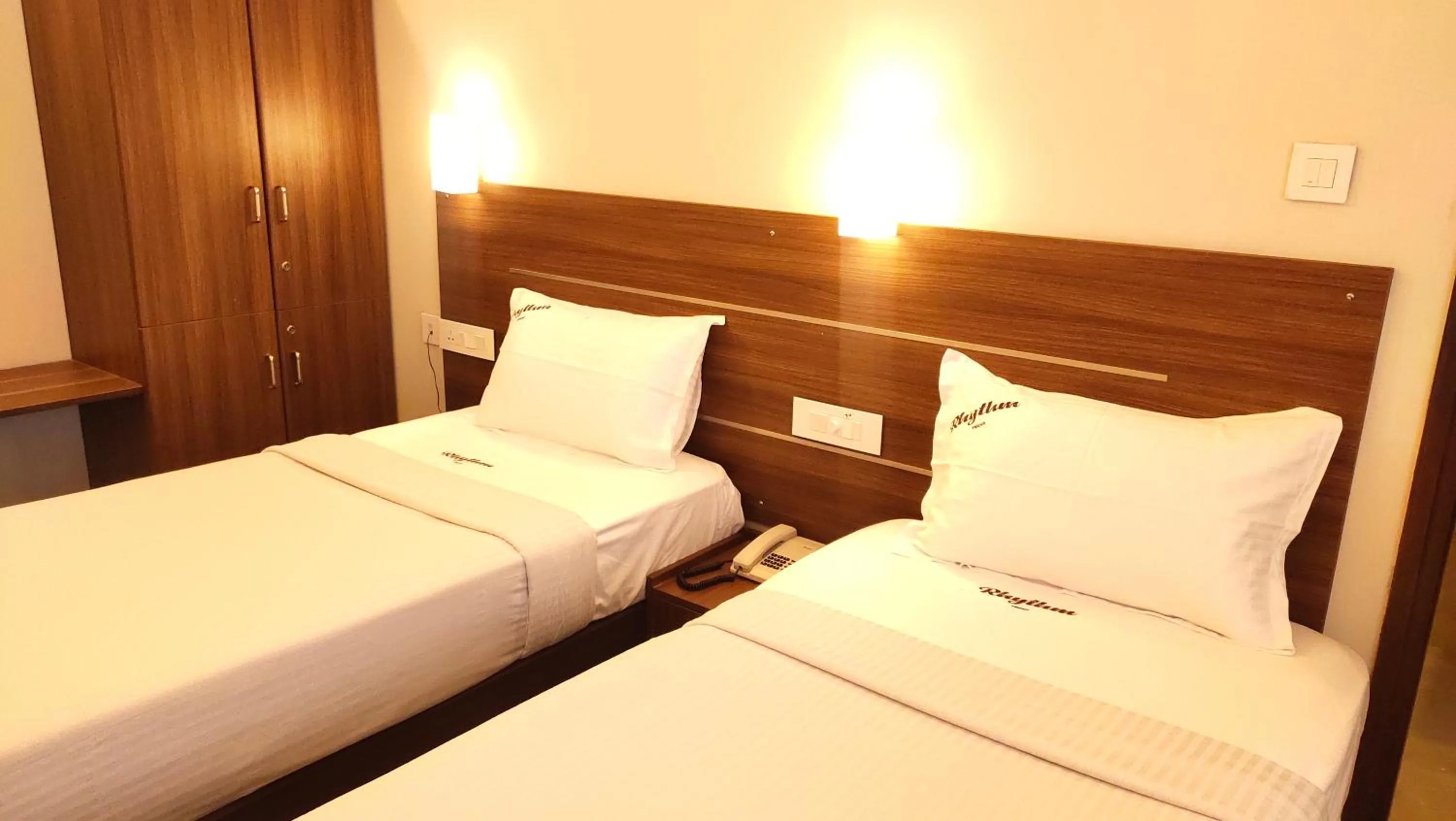 Bed in Hotel Rhythm Grand Suite