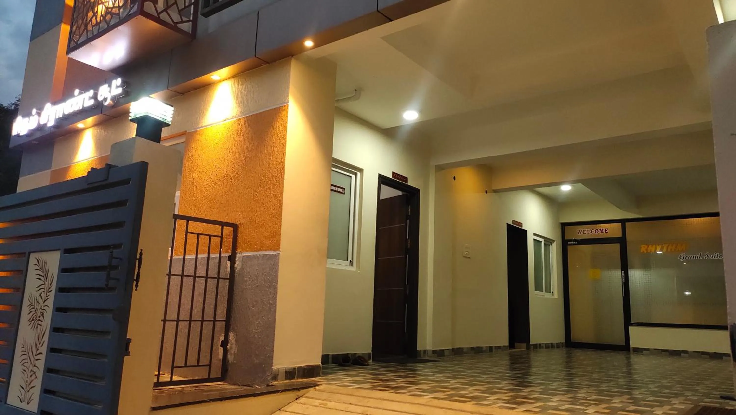 Property logo or sign in Hotel Rhythm Grand Suite