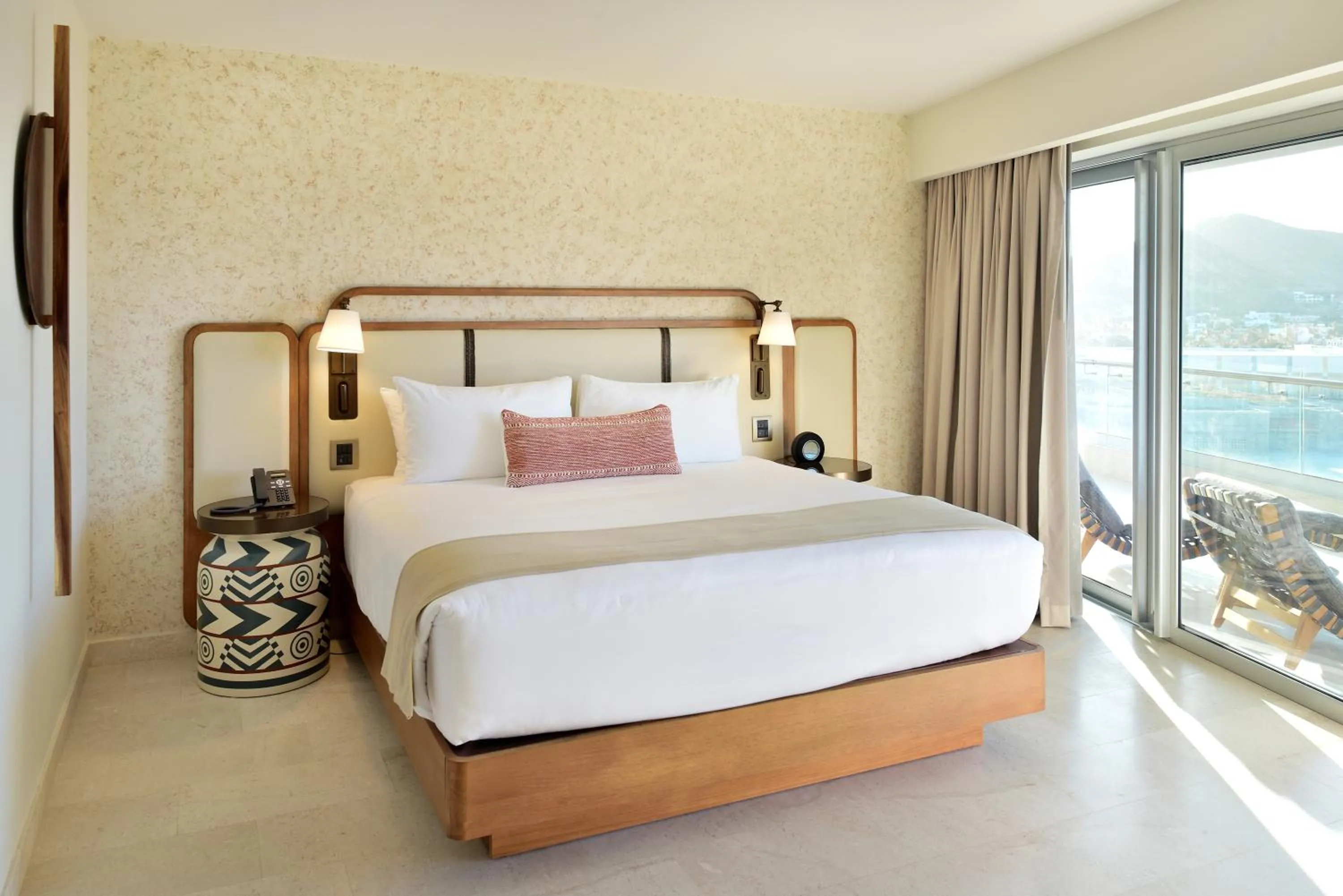 Bed in Corazón Cabo, a Noble House Resort