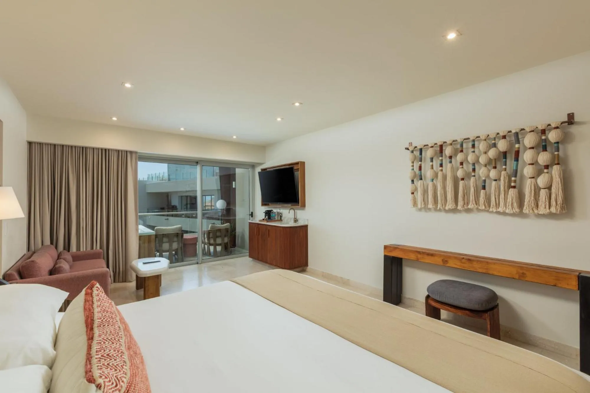 Bed in Corazón Cabo, a Noble House Resort