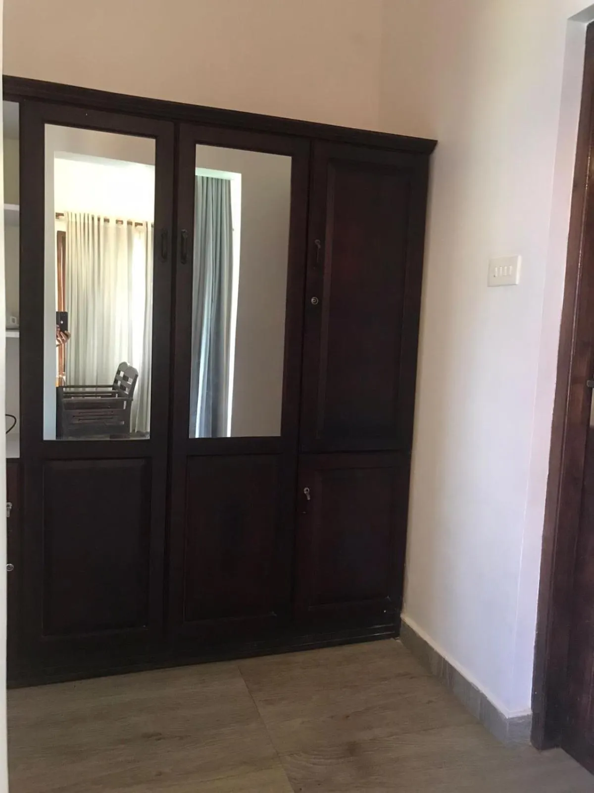 wardrobe in The Marine Pride Beach Resort & Spa