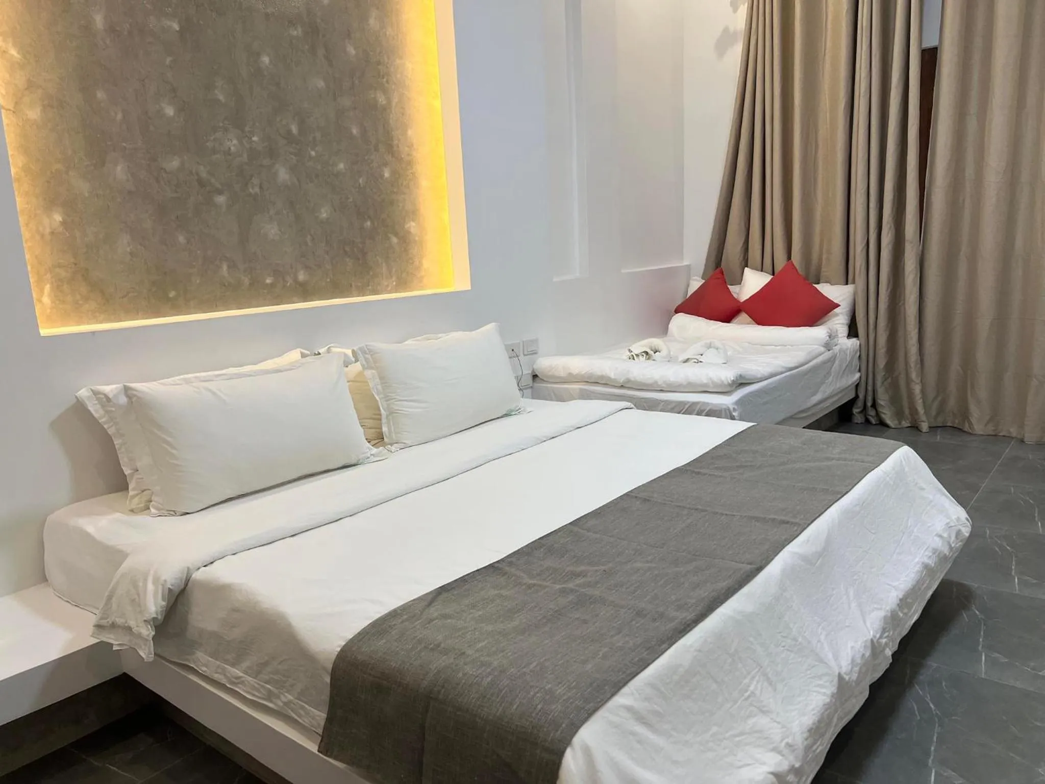 Bed in Bohol Coastal View Hotel