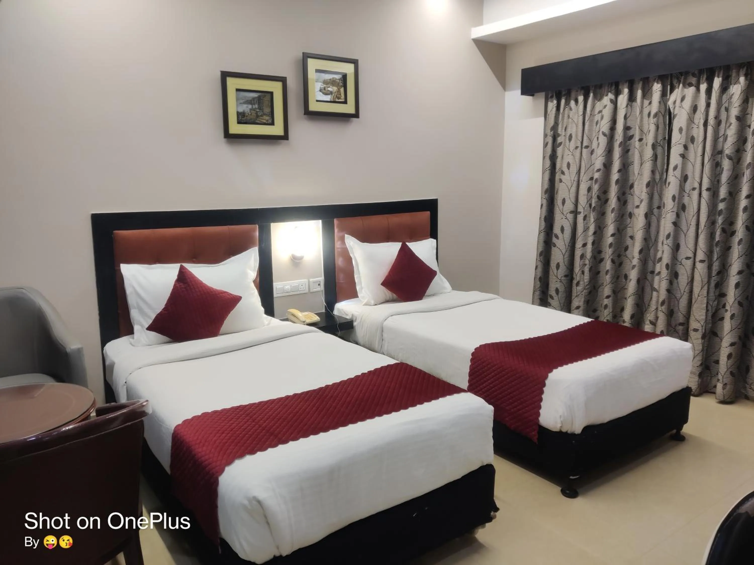 Photo of the whole room, Bed in Hotel Delphi Grand Hyderabad - Hi-Tech City, Perfect for Business & Comfort