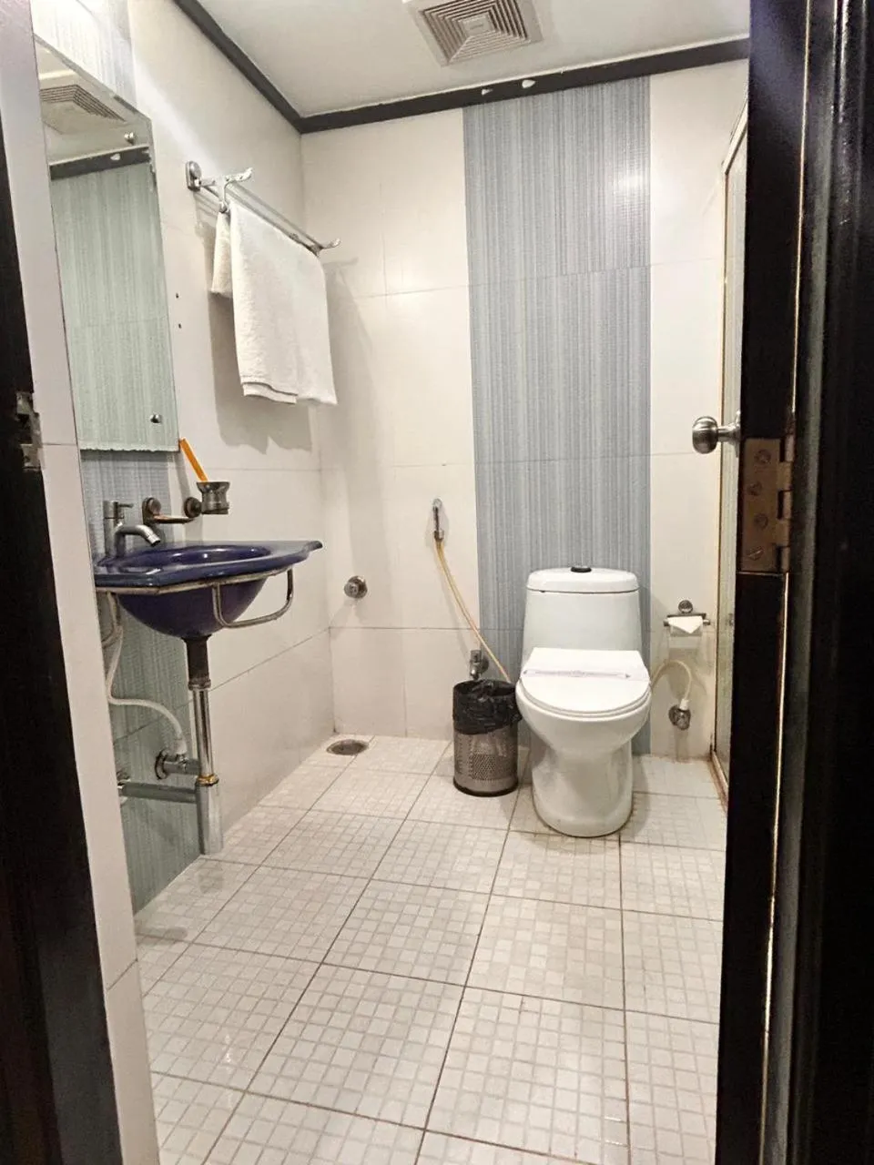 Bathroom in Hotel Delphi Grand Hyderabad - Hi-Tech City, Perfect for Business & Comfort