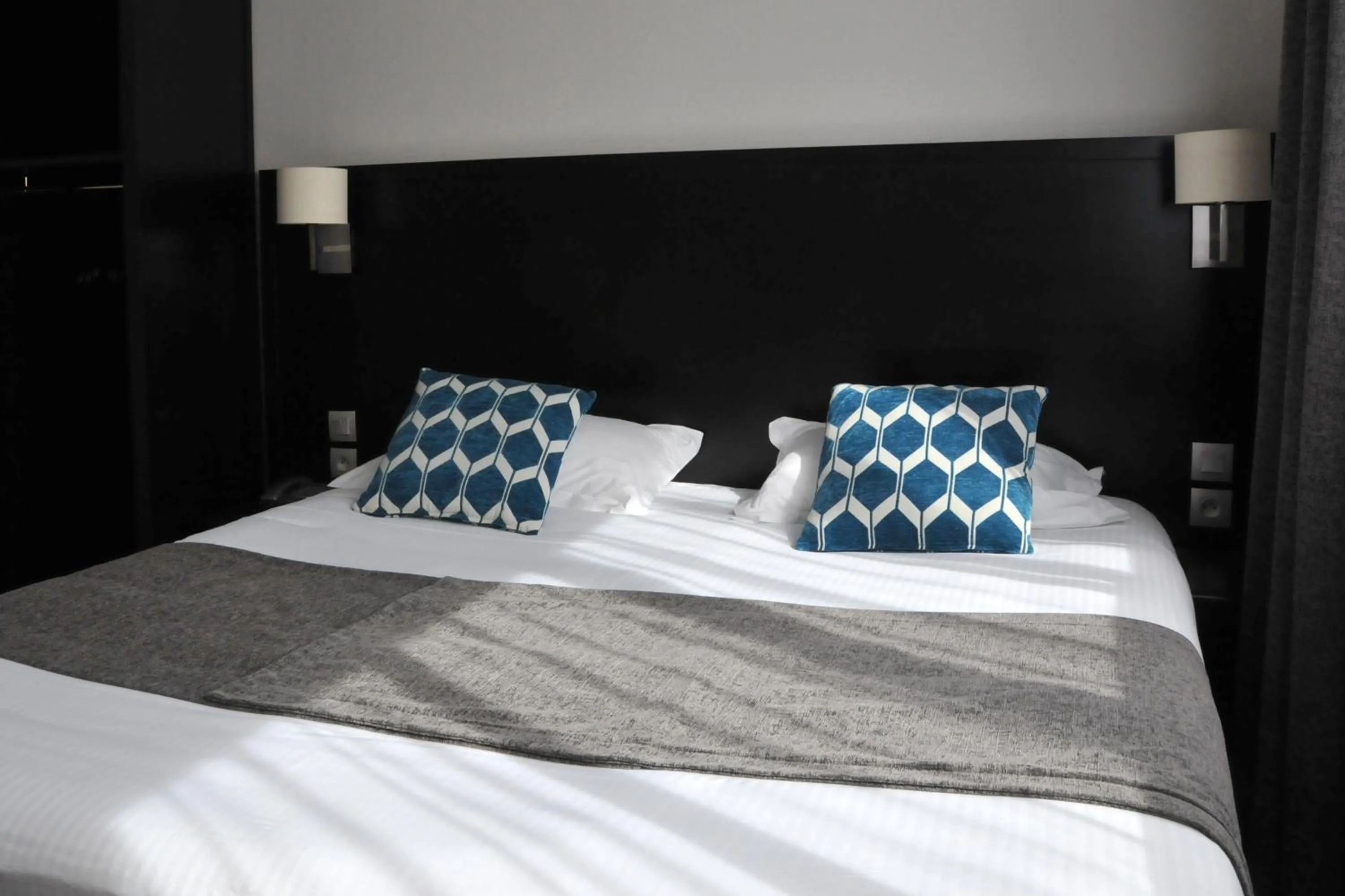 Bed in Hôtel Des Quatrans