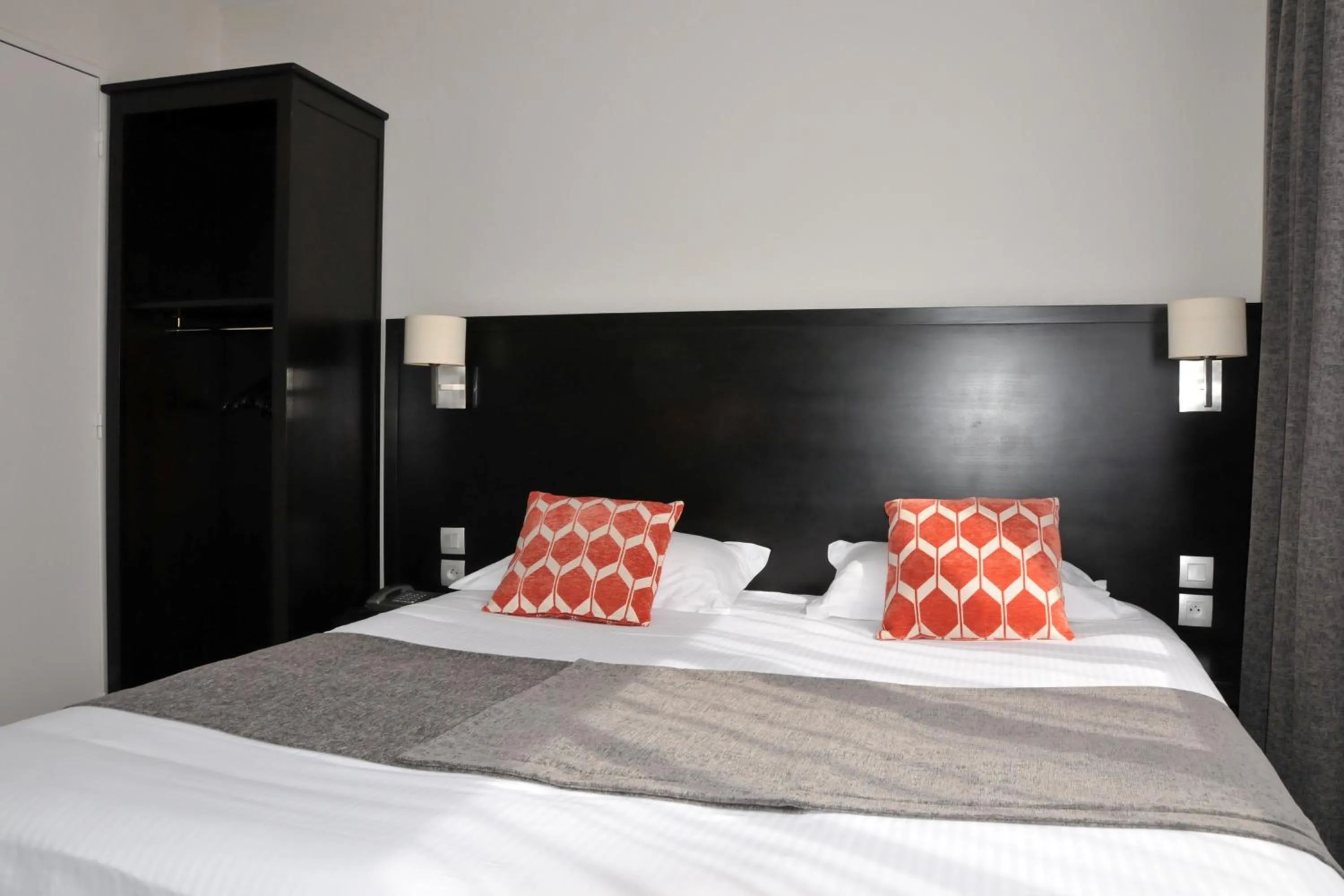 Bed in Hôtel Des Quatrans