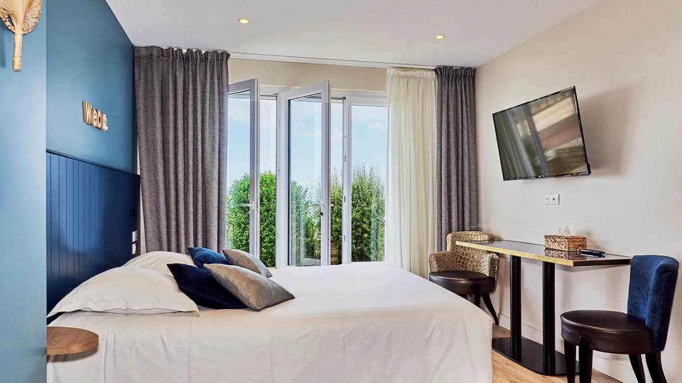 Bed in La Cremaillere Hôtel-Restaurant