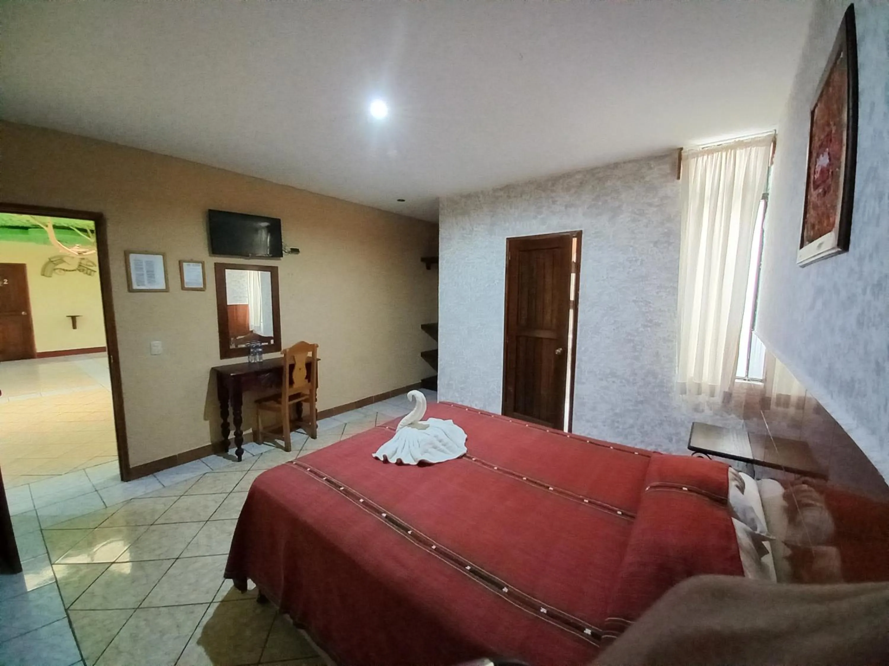 Photo of the whole room, Bed in Hotel Nakbé Atitlán