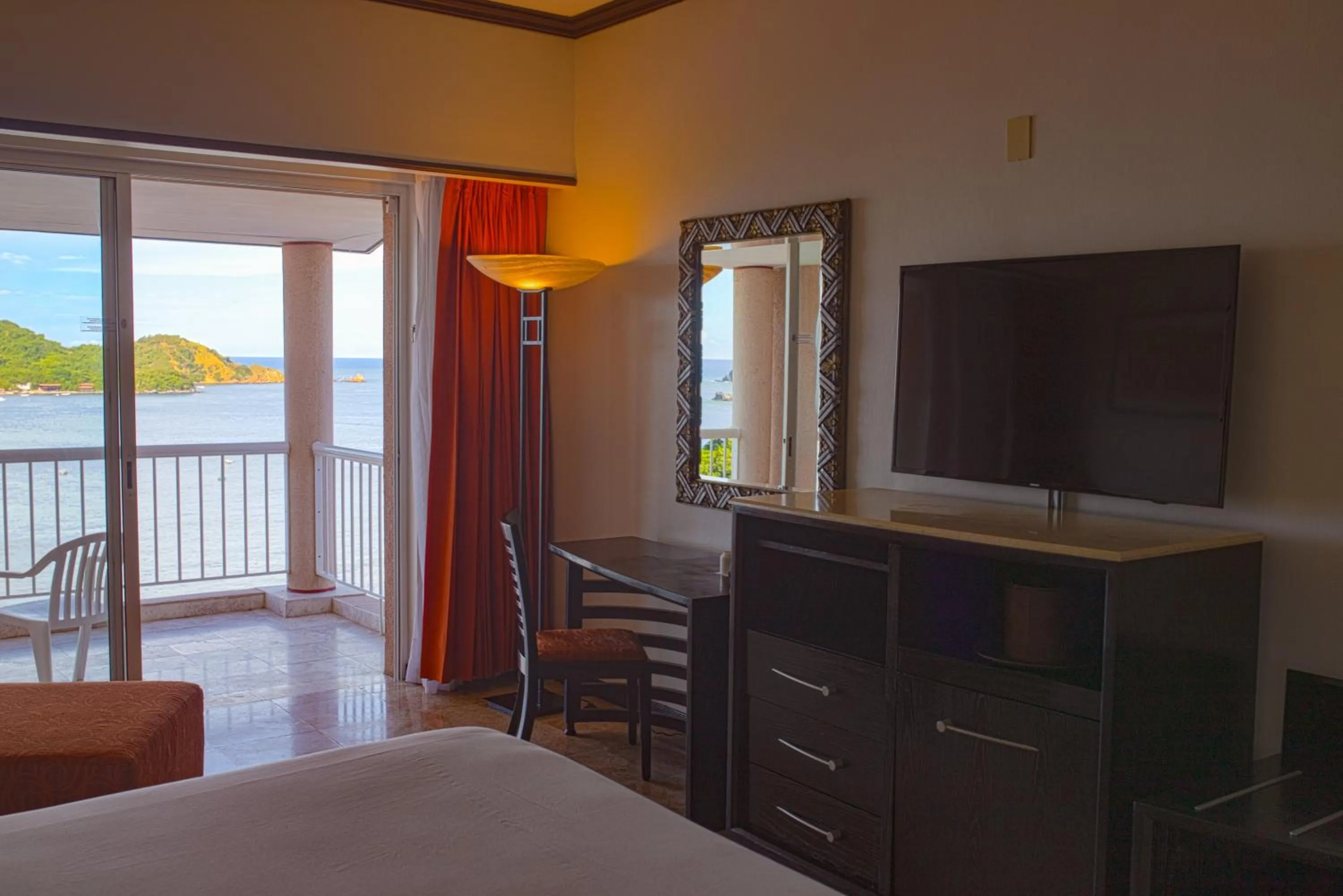 Balcony/Terrace, TV/Entertainment Center in Azul Ixtapa Beach Resort & Convention Center - All Inclusive