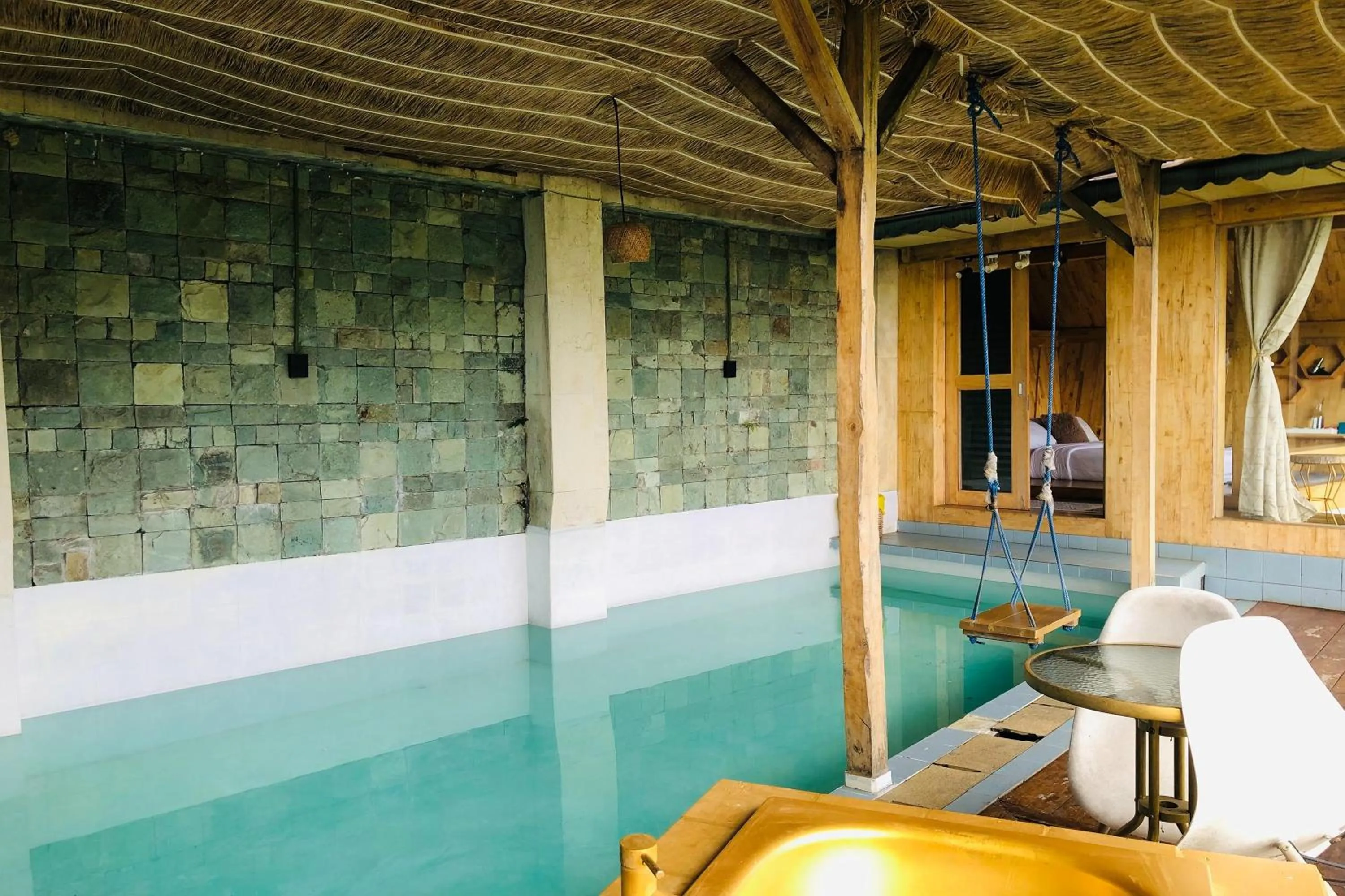 Swimming pool in Mendulang by Belza