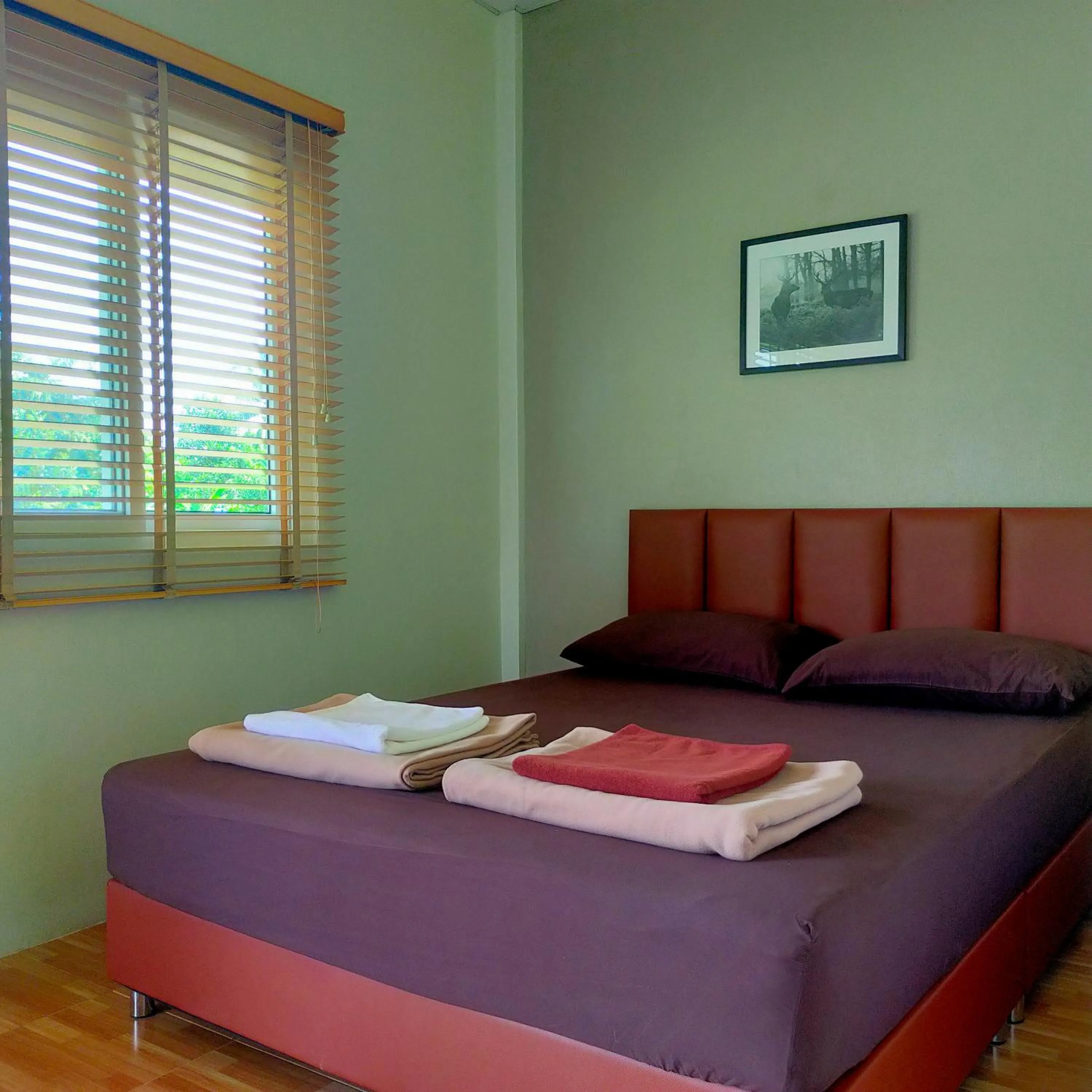 Bed in Davy Cottage Phuket