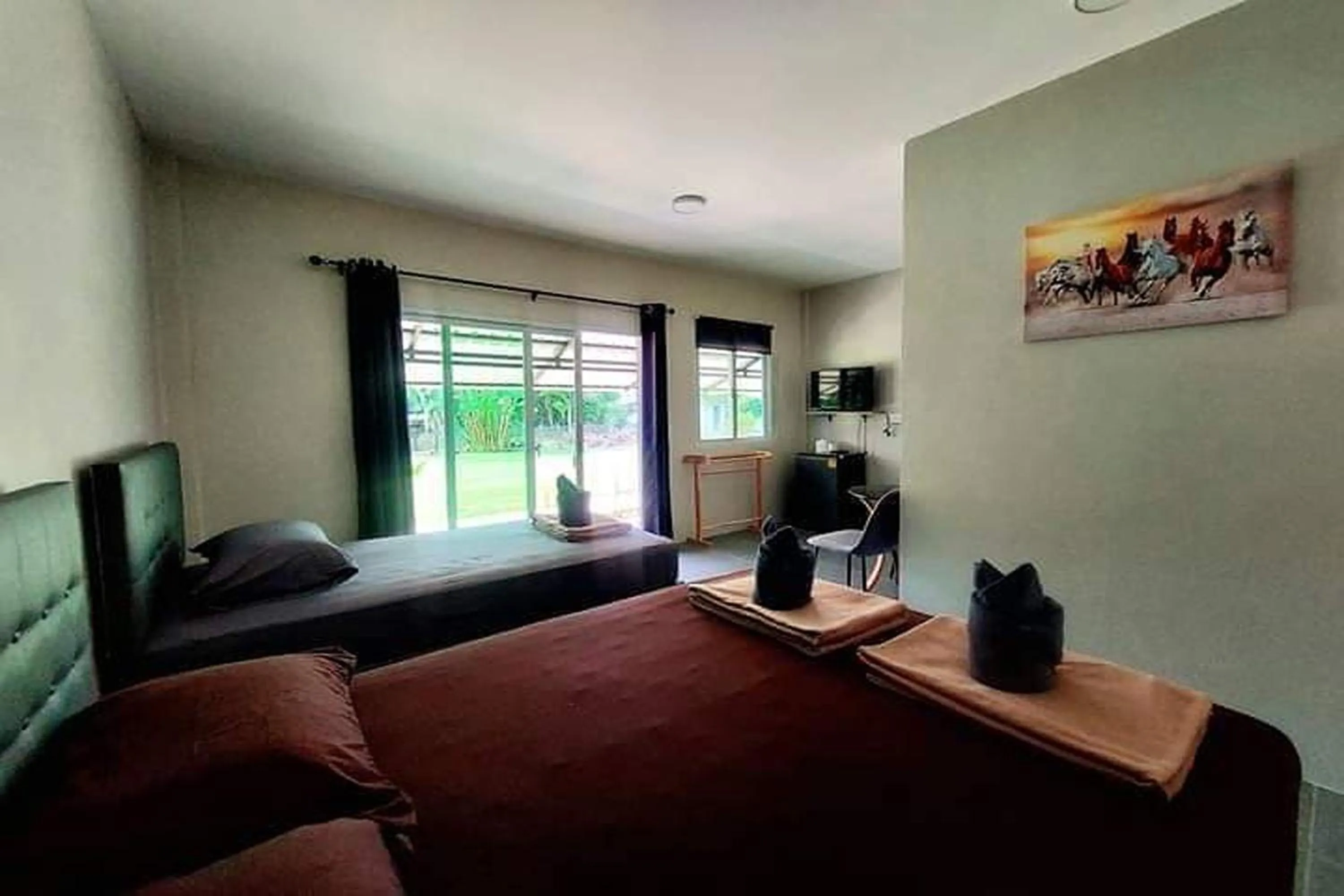 Bed in Davy Cottage Phuket