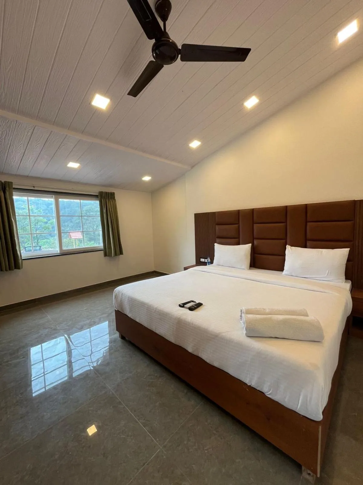 Bed in Khushi Riverside Resort & Spa