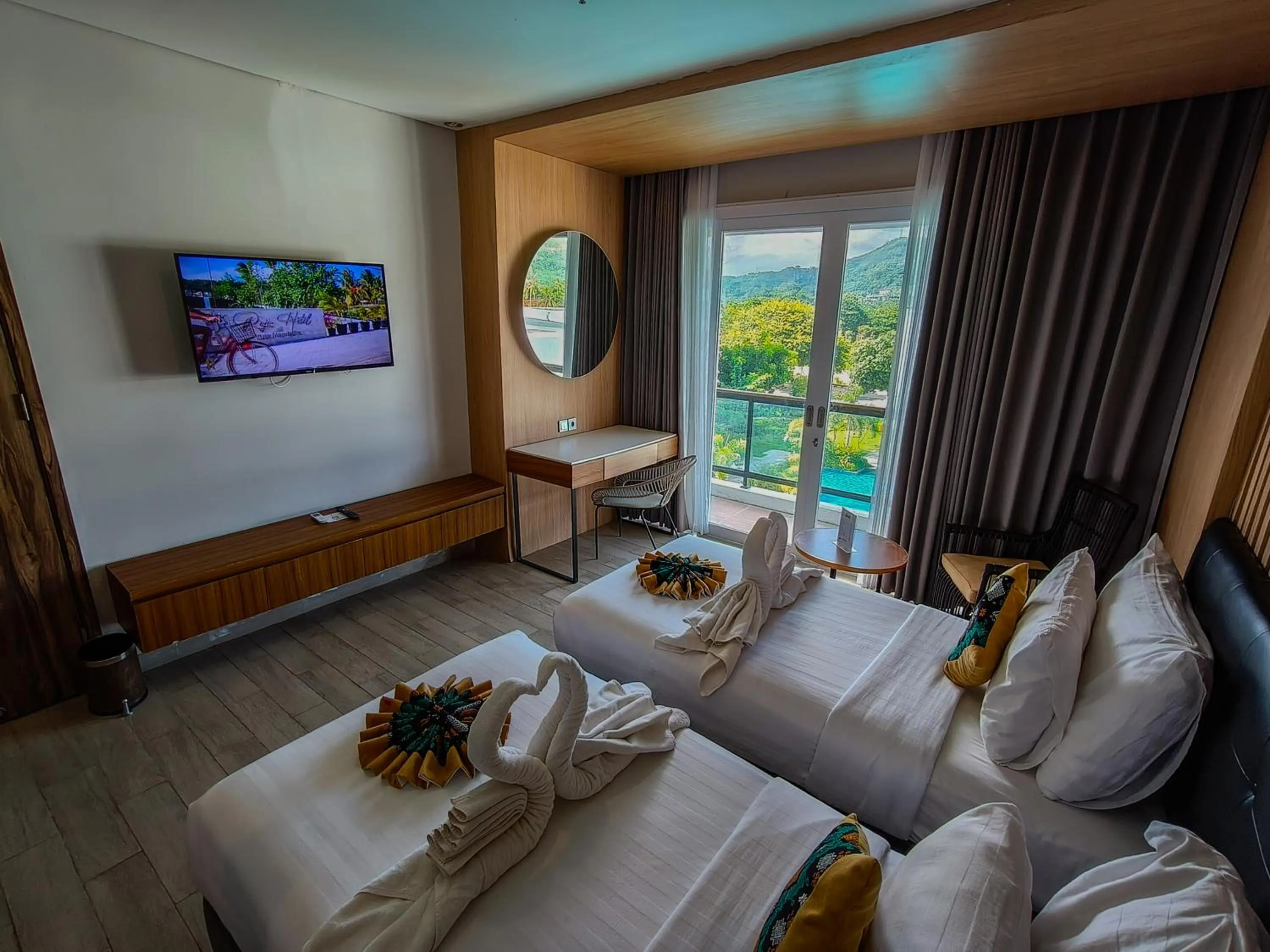 Bed in Raja Hotel Kuta Mandalika Resort & Convention