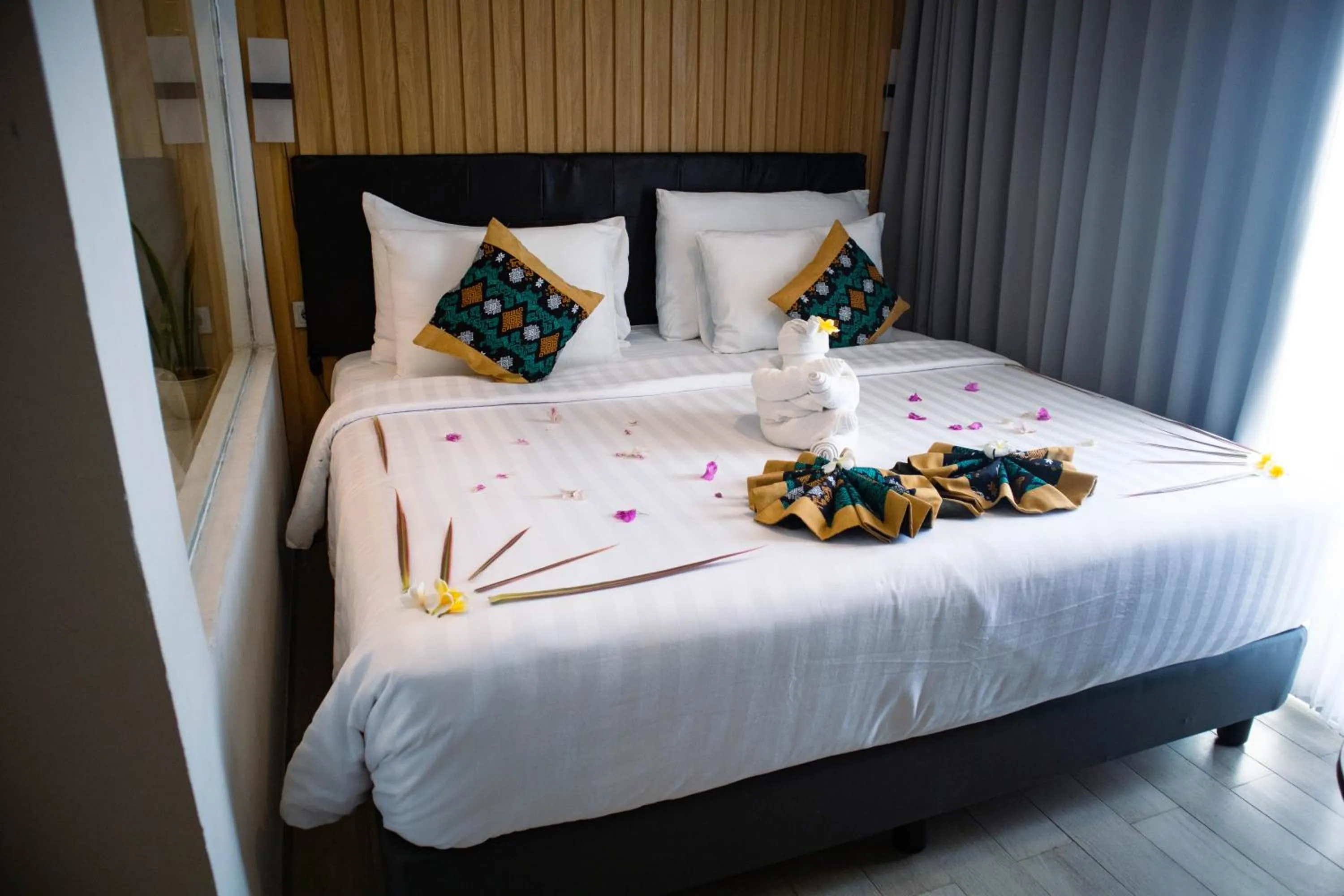 Bed in Raja Hotel Kuta Mandalika Resort & Convention