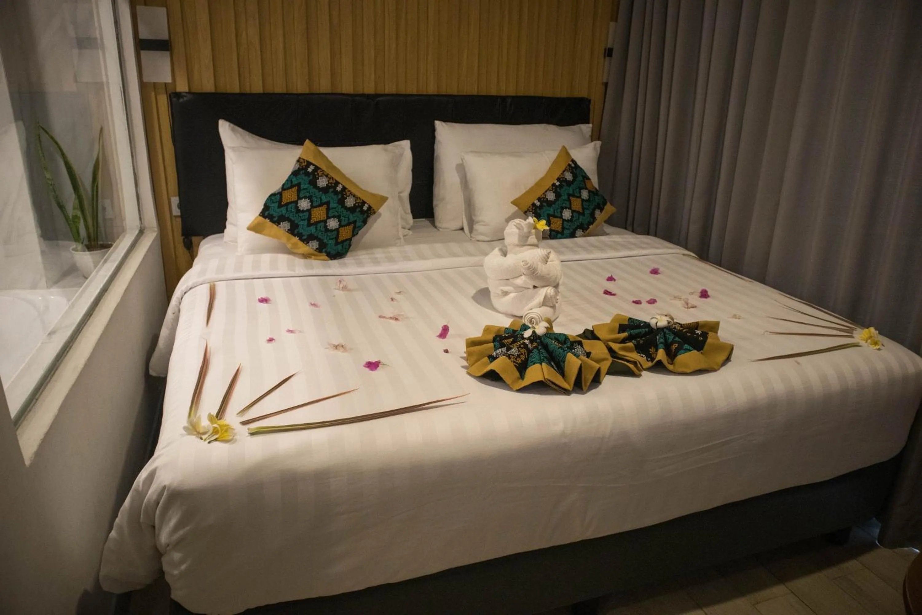 Bed in Raja Hotel Kuta Mandalika Resort & Convention