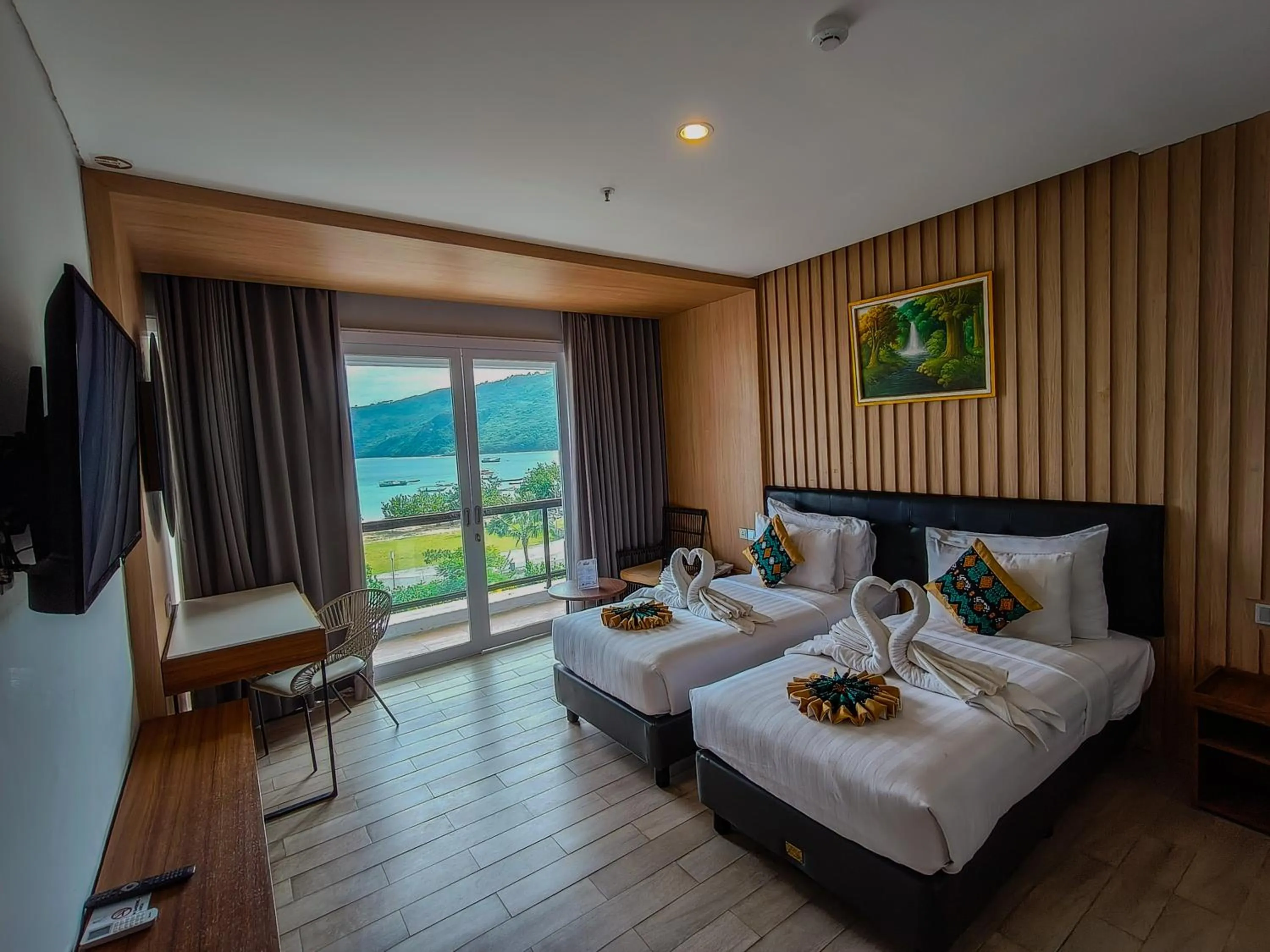 Bed in Raja Hotel Kuta Mandalika Resort & Convention