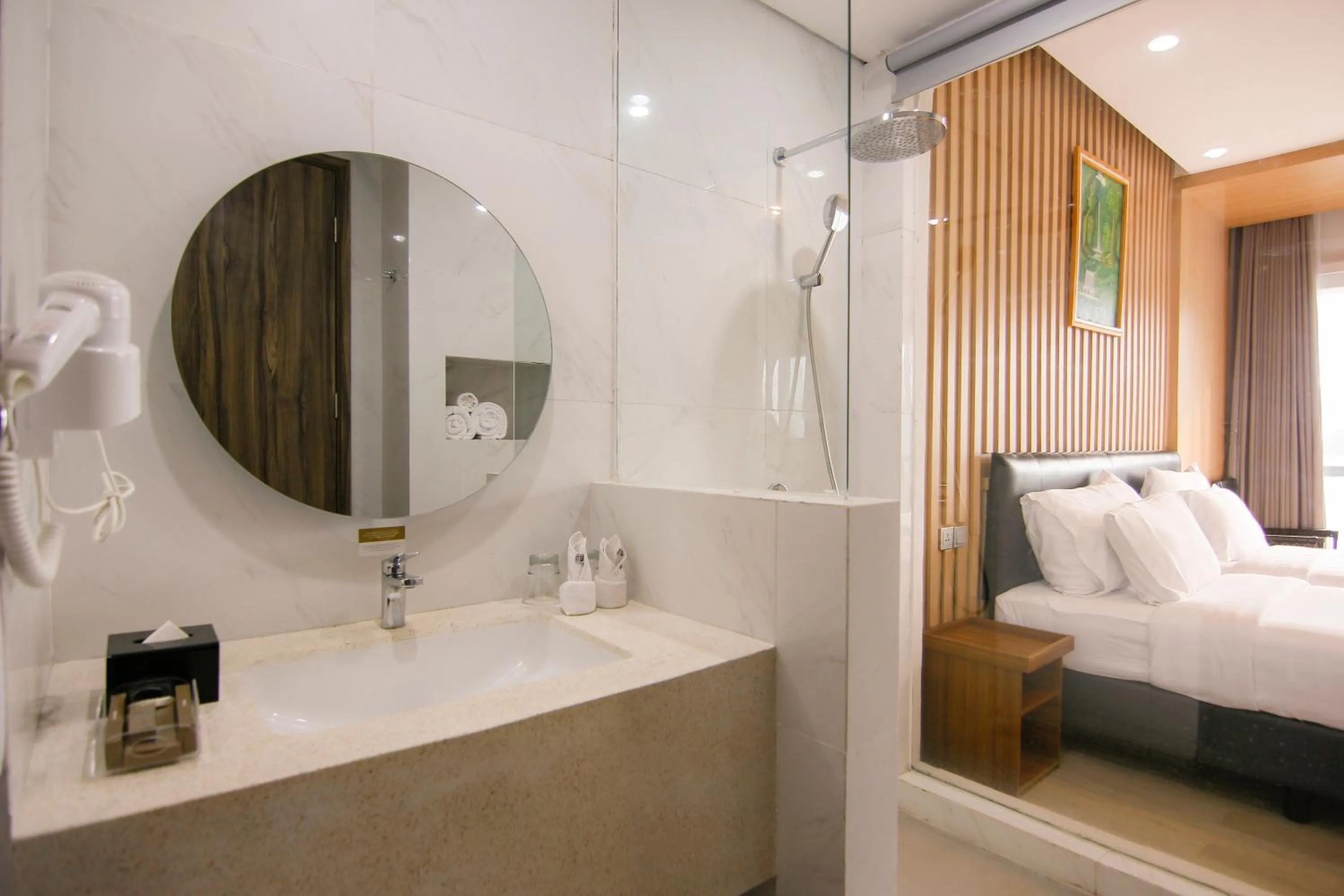 Bed in Raja Hotel Kuta Mandalika Resort & Convention