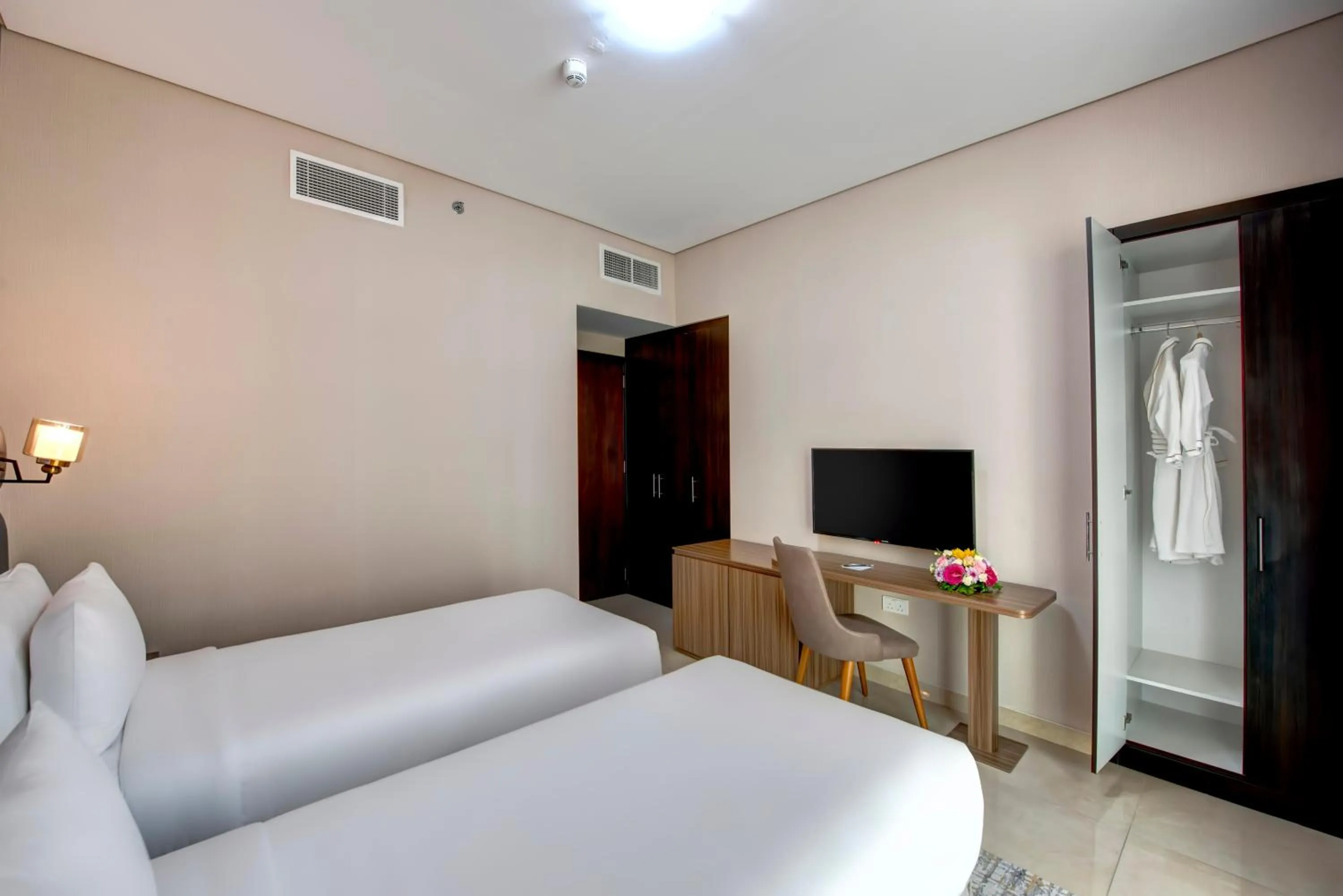 Bed in Royal Regency Suites Marina