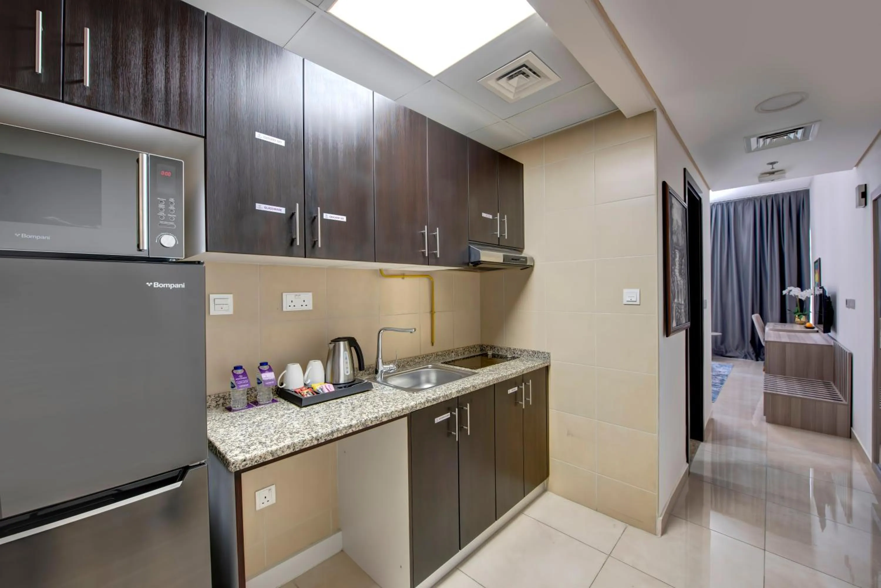 Kitchen or kitchenette in Royal Regency Suites Marina