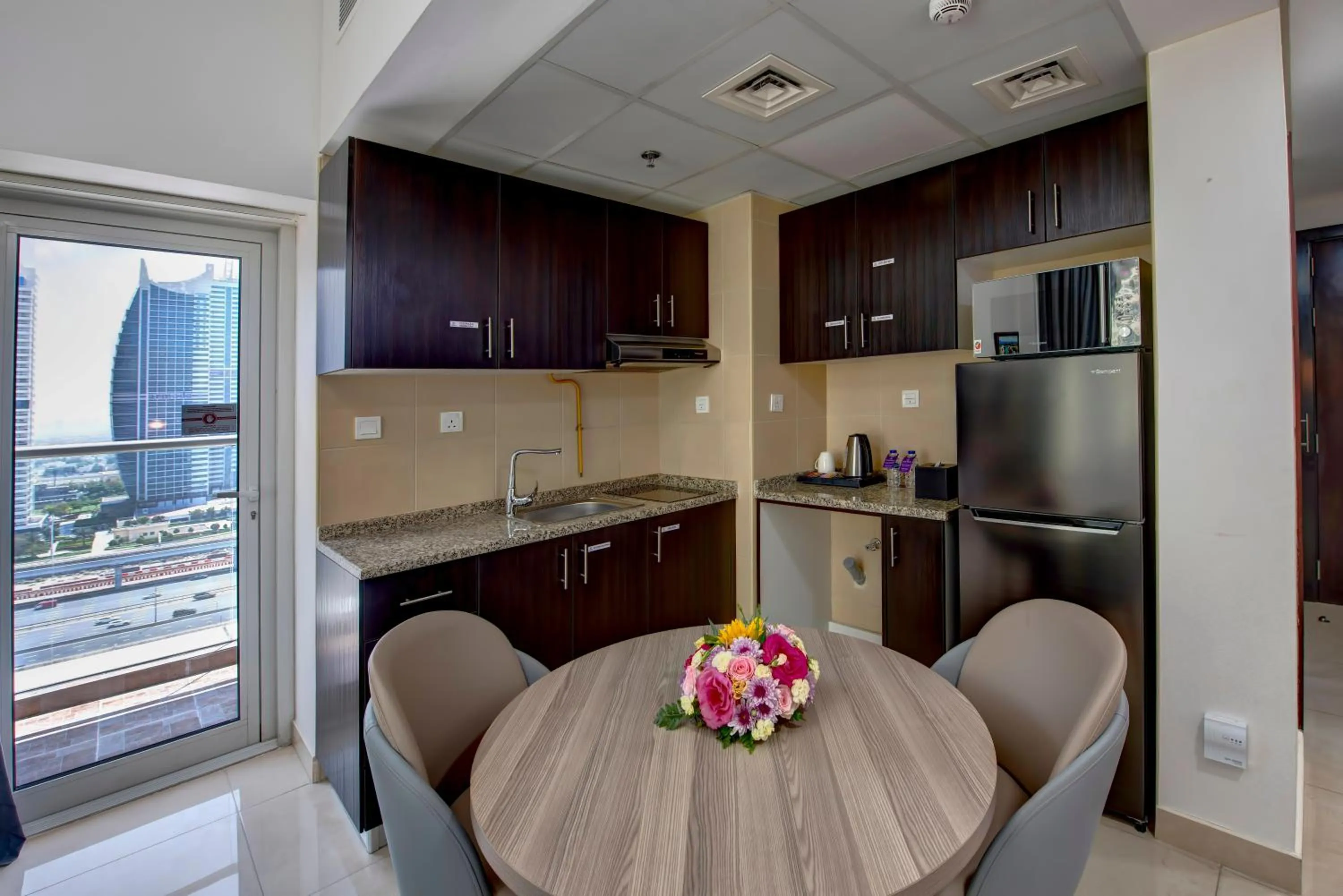 Kitchen or kitchenette in Royal Regency Suites Marina