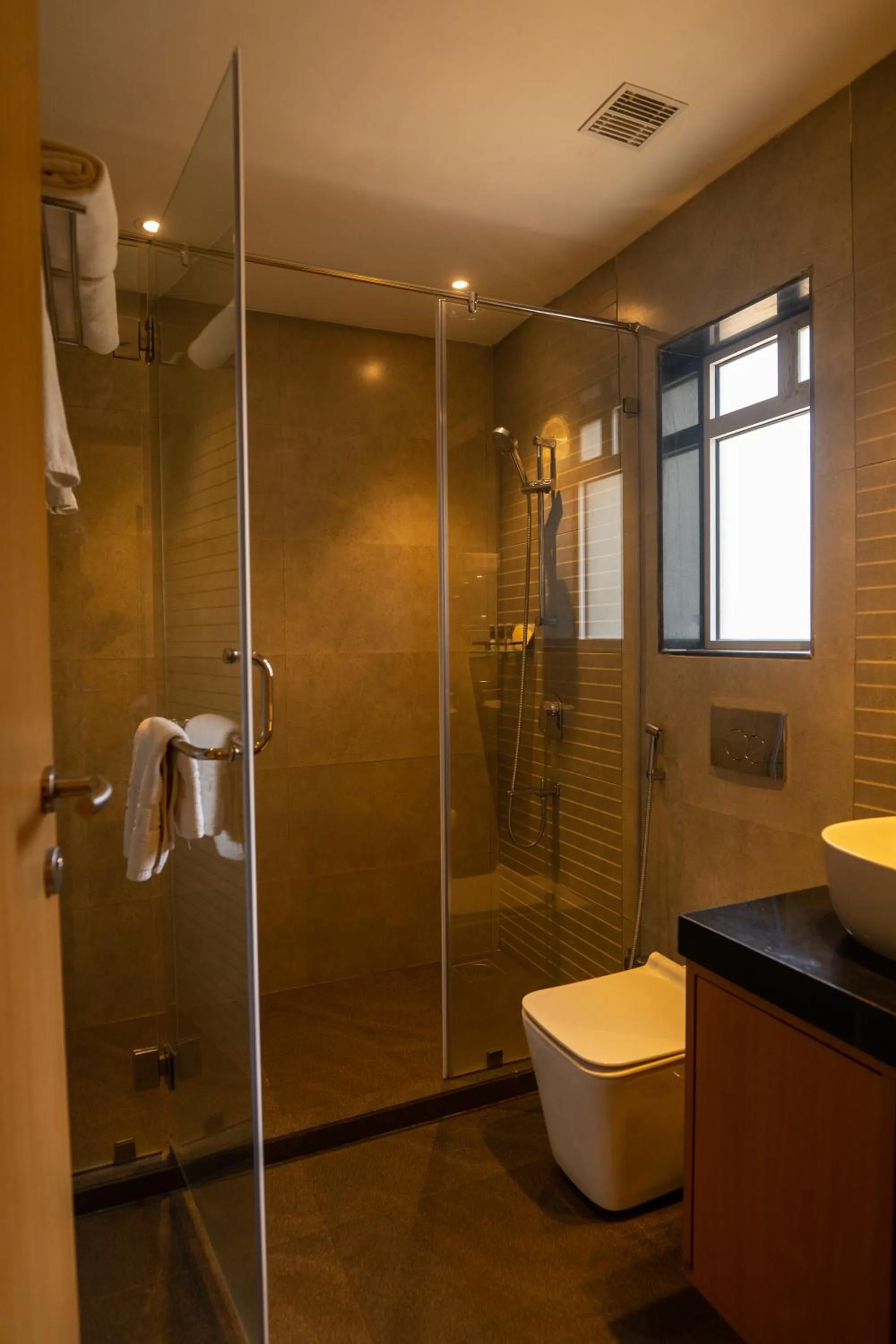 Bathroom in U Rivergate Resort & Spa, Karjat