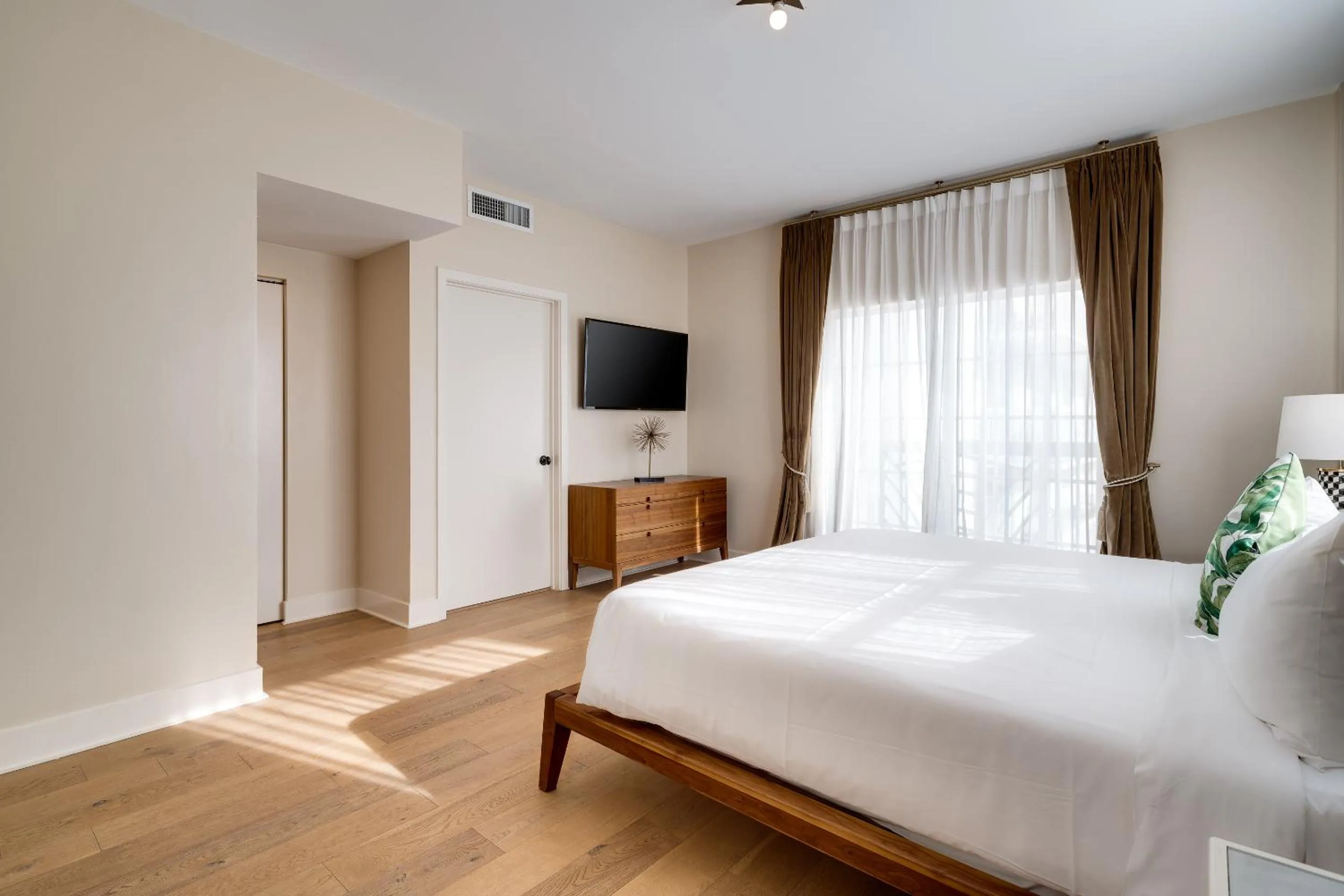 Bed in The Savoy Hotel & Beach Club