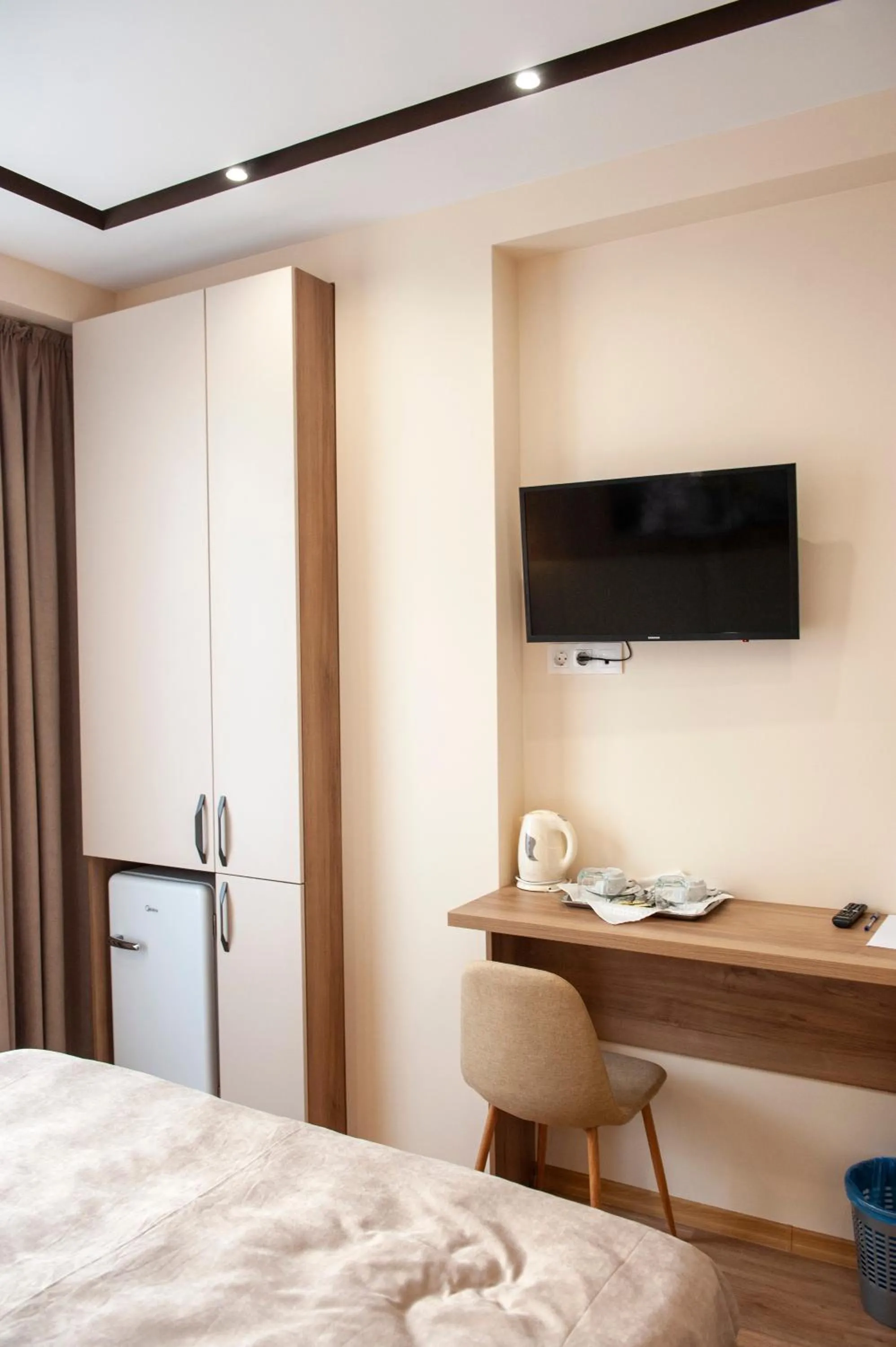 Bed in Lotus Hotel Chisinau