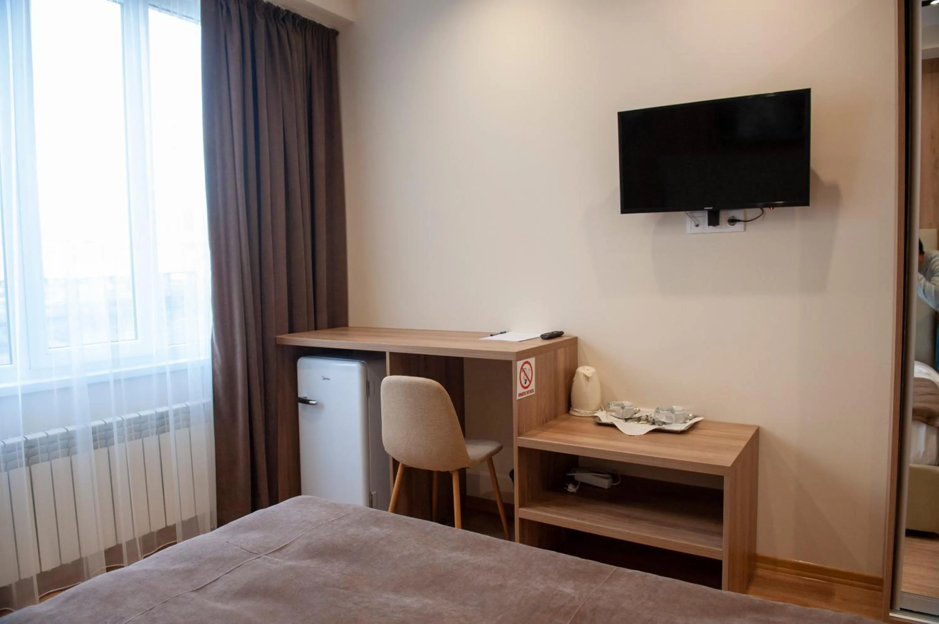 Bed in Lotus Hotel Chisinau