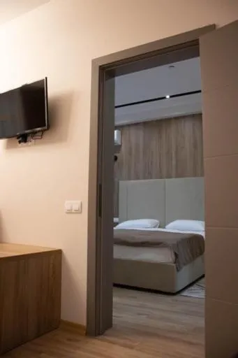 Bed in Lotus Hotel Chisinau