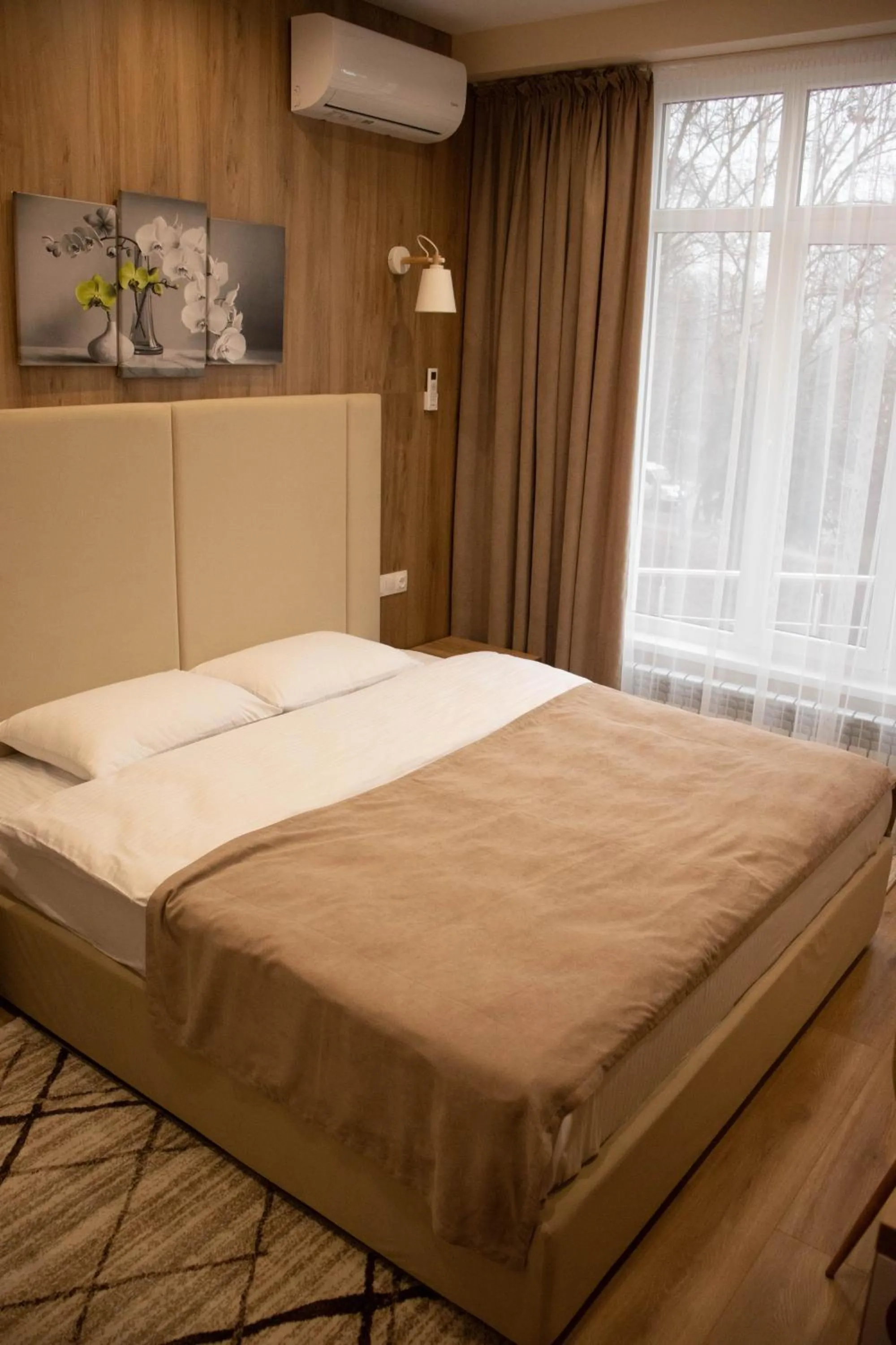 Bed in Lotus Hotel Chisinau