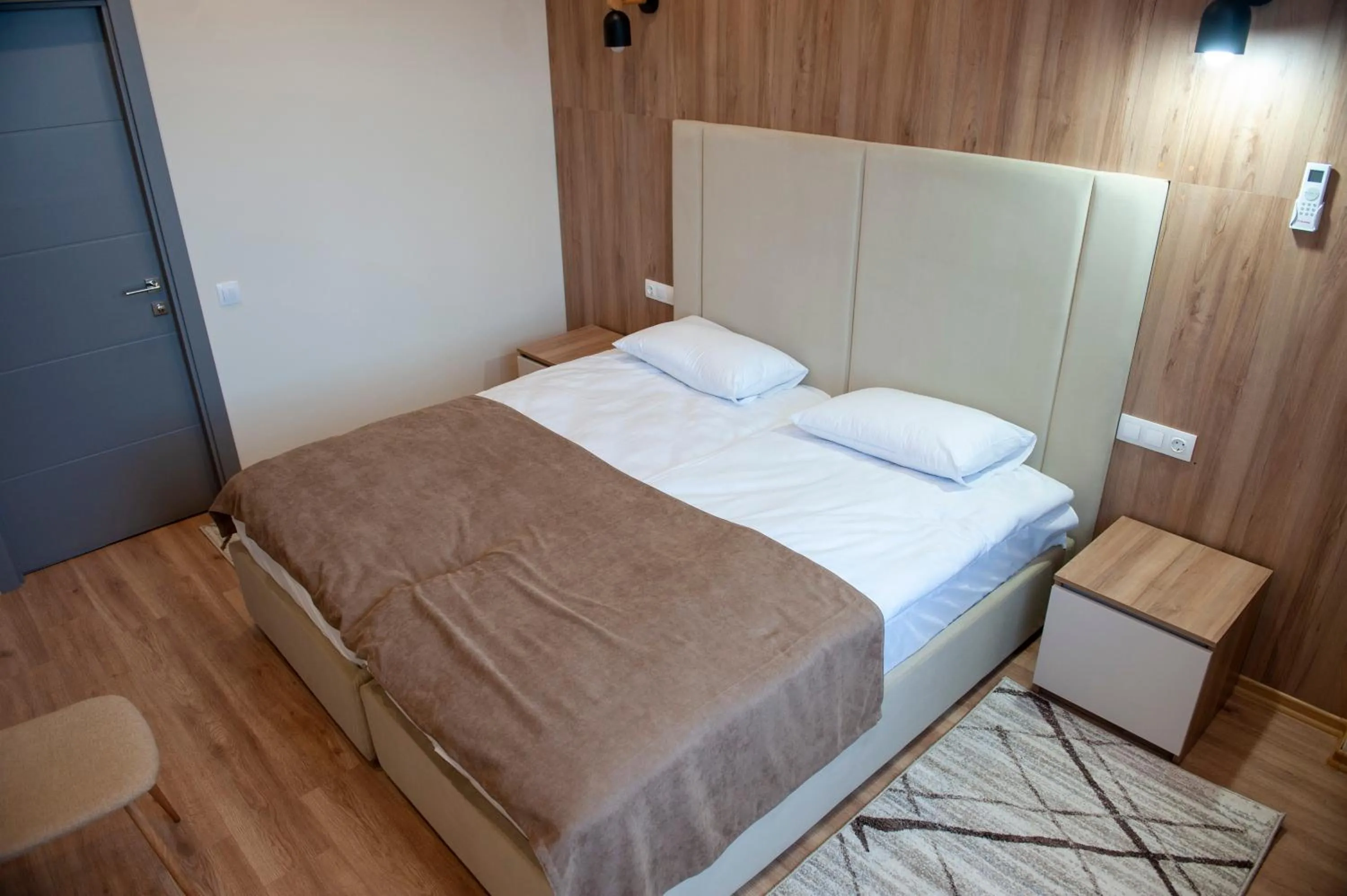 Bed in Lotus Hotel Chisinau