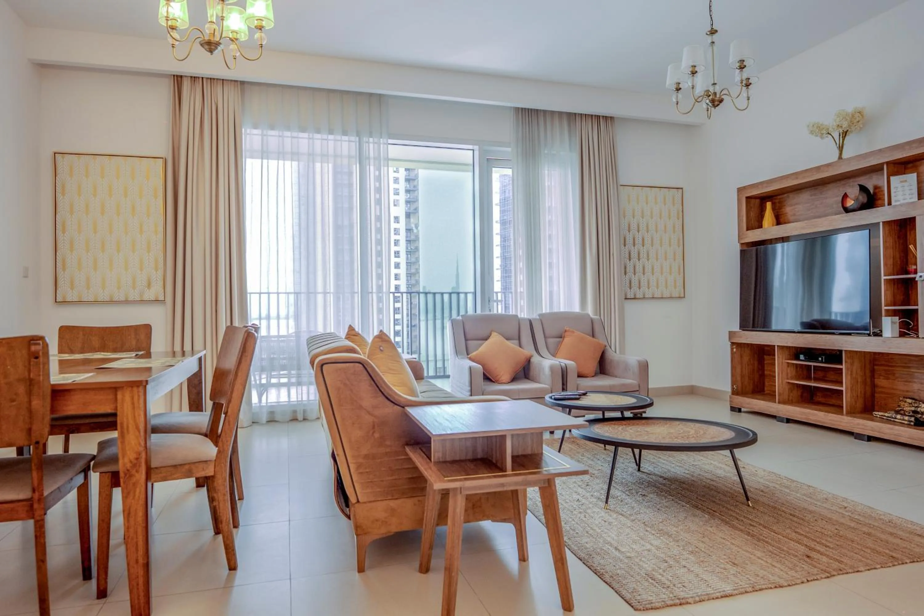 Communal lounge/ TV room in 3BR Haven with Burj Views by MagnoliasVHR