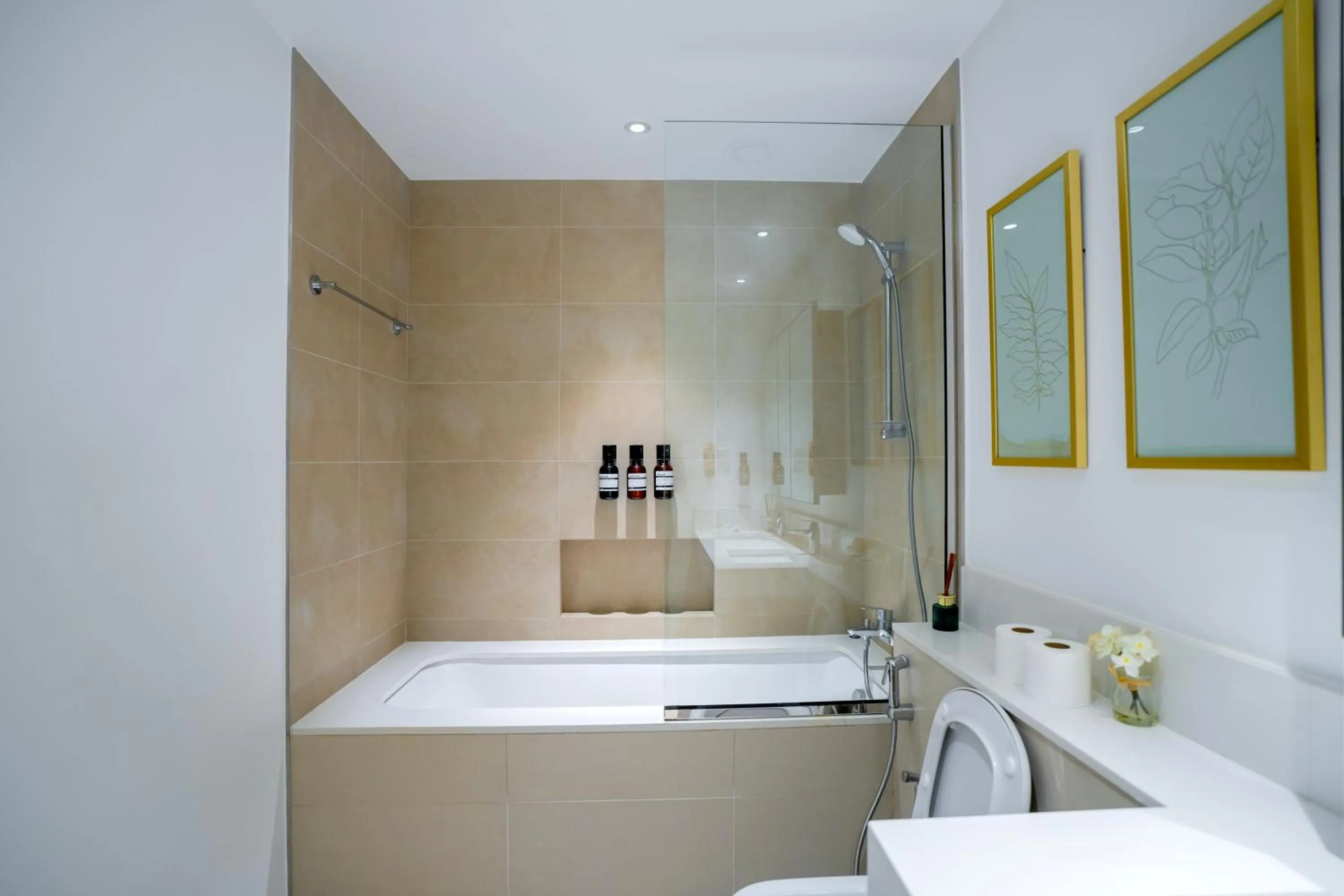 Shower in 3BR Haven with Burj Views by MagnoliasVHR