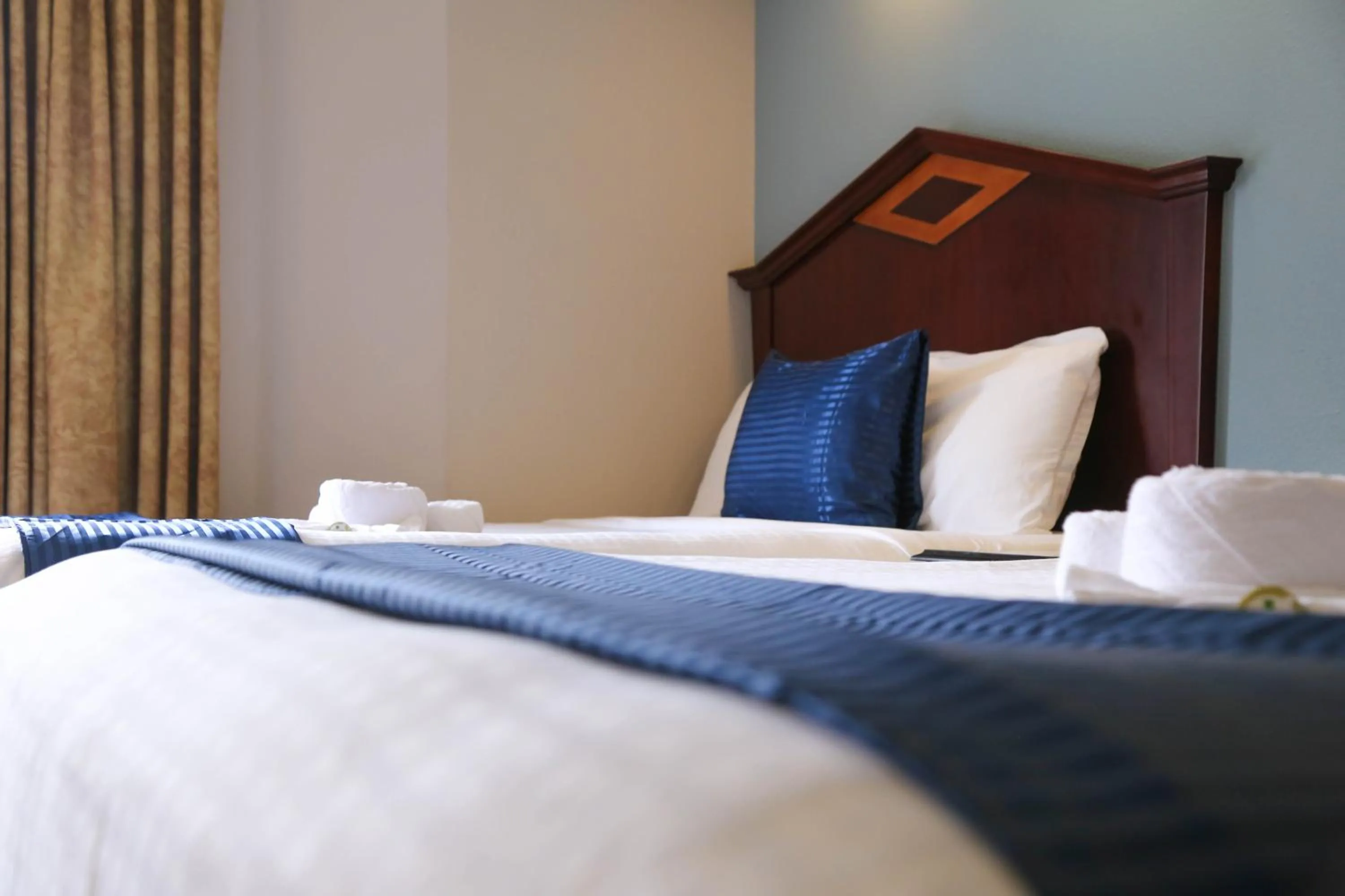 Bed in Destiny Palms Hotel Maingate West