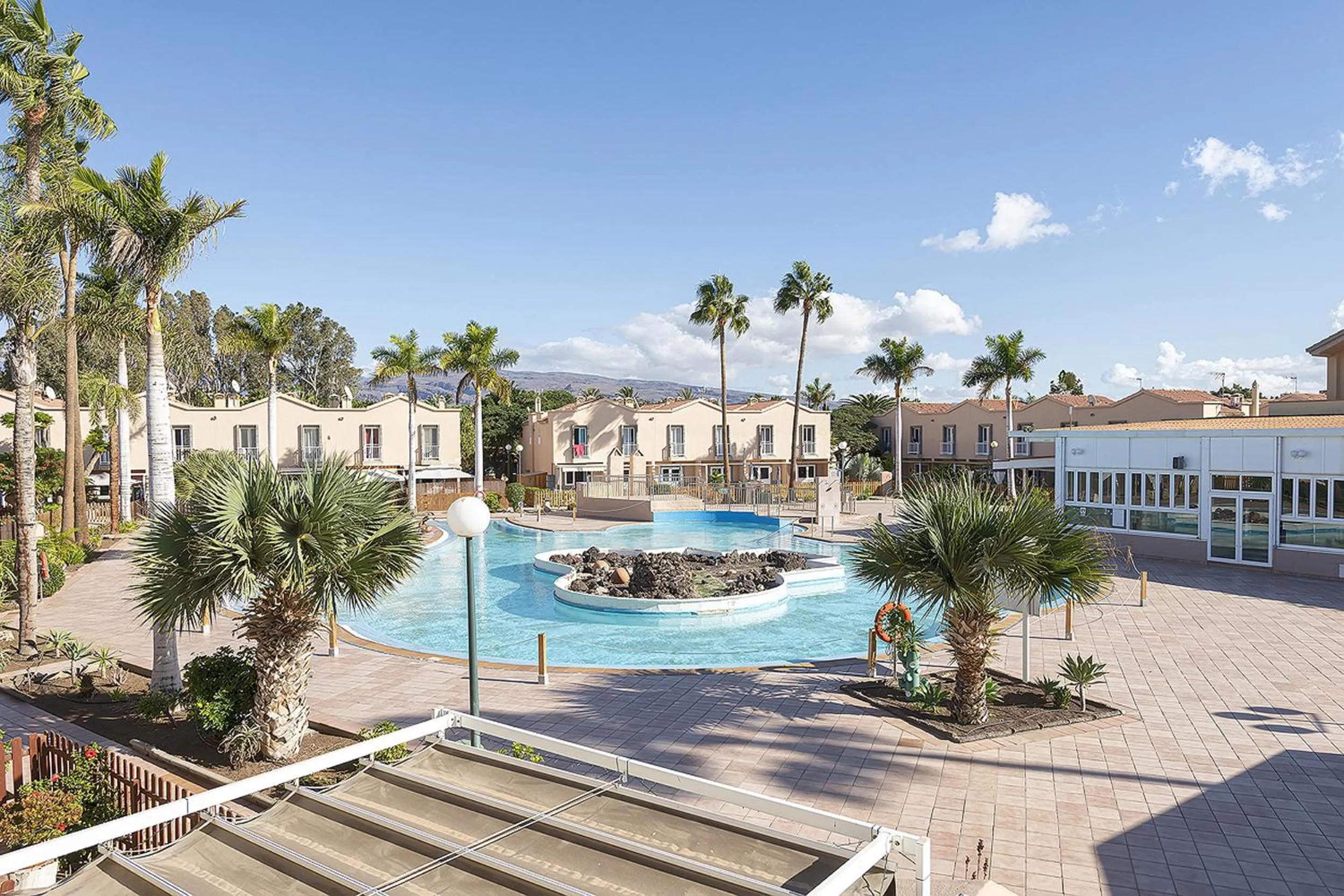 Pool view in Villetta Green oasis club