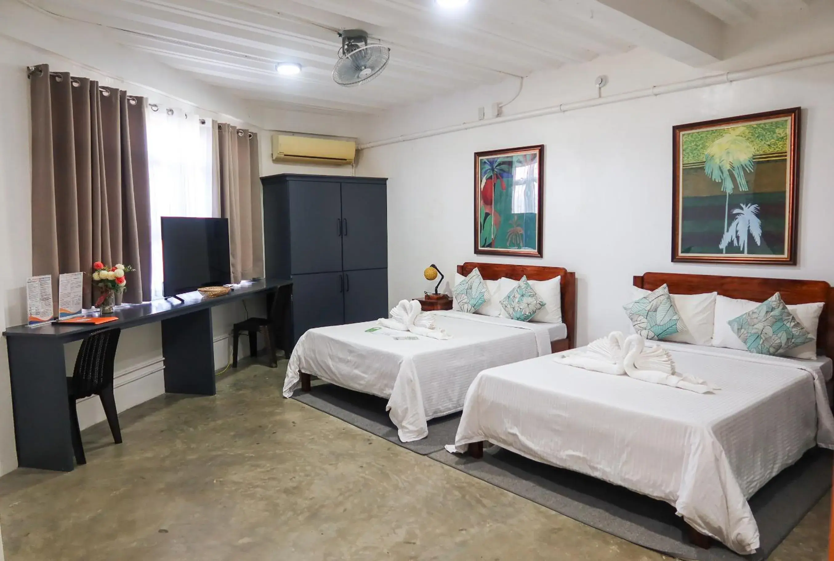 Deluxe Queen Room with Two Queen Beds in AV Suites Deluxe Queen Room with Two Queen Beds in AV Suites