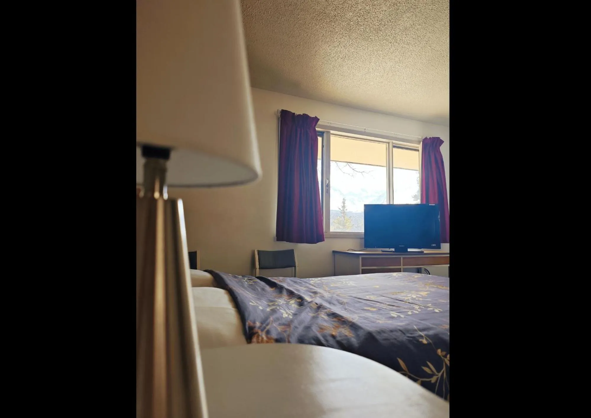 Bed in Cozy Corner Motel & Restaurant