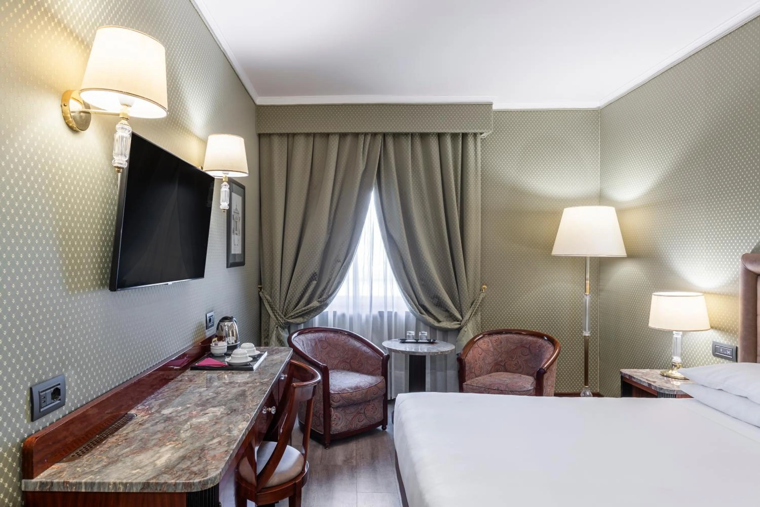 TV and multimedia, Bed in Doria Grand Hotel