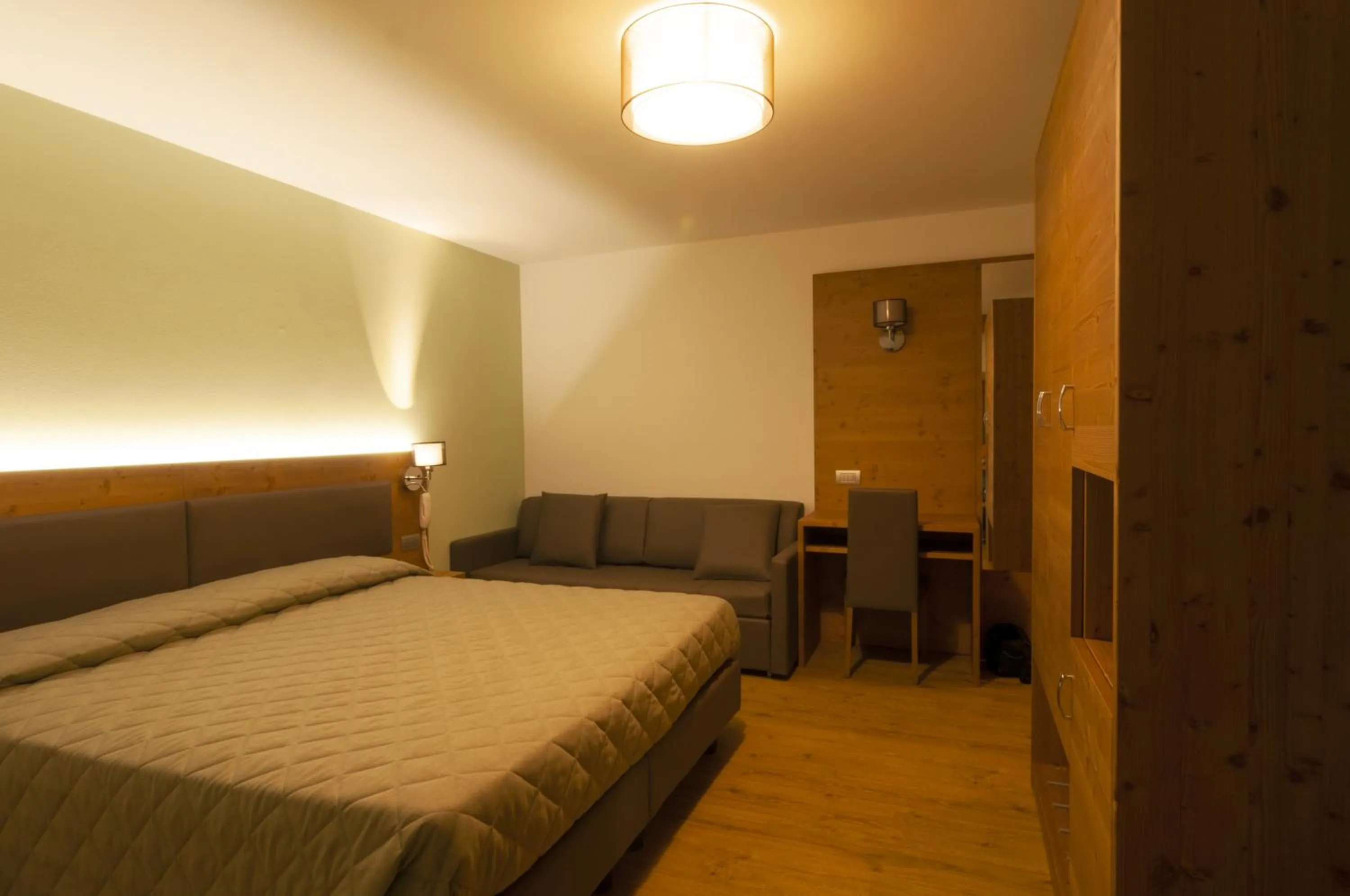 Bed in Albergo Antelao