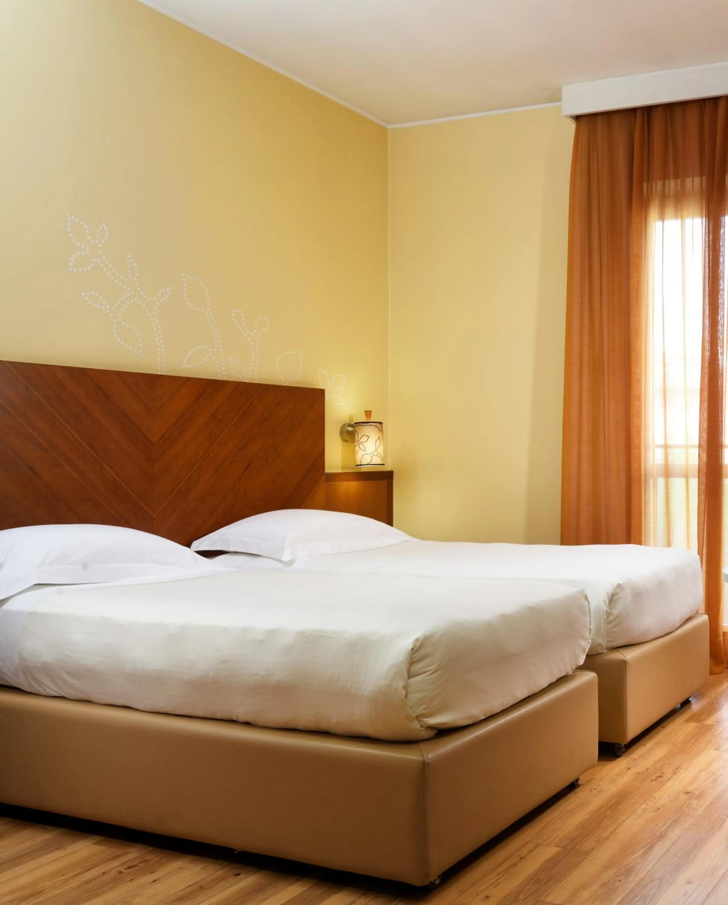 Bedroom, Bed in UNA Hotels Mediterraneo Milano