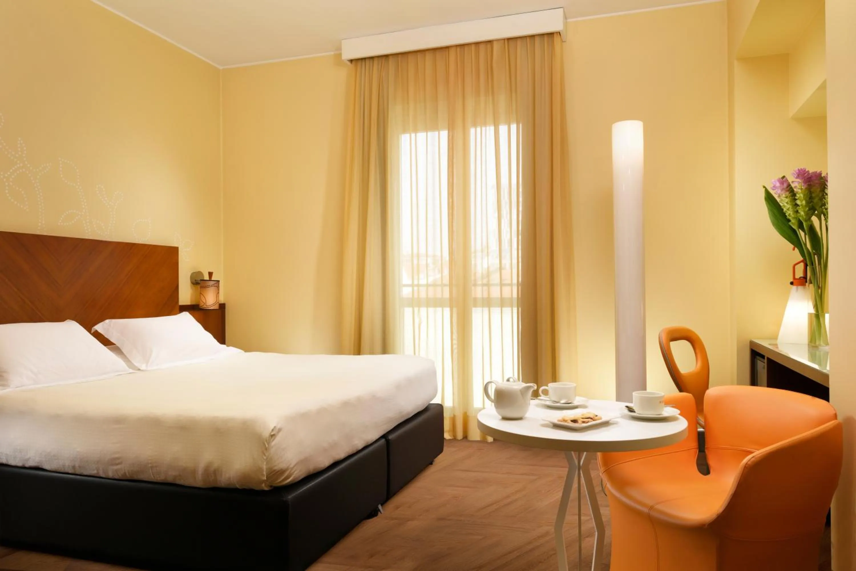Bedroom, Bed in UNA Hotels Mediterraneo Milano