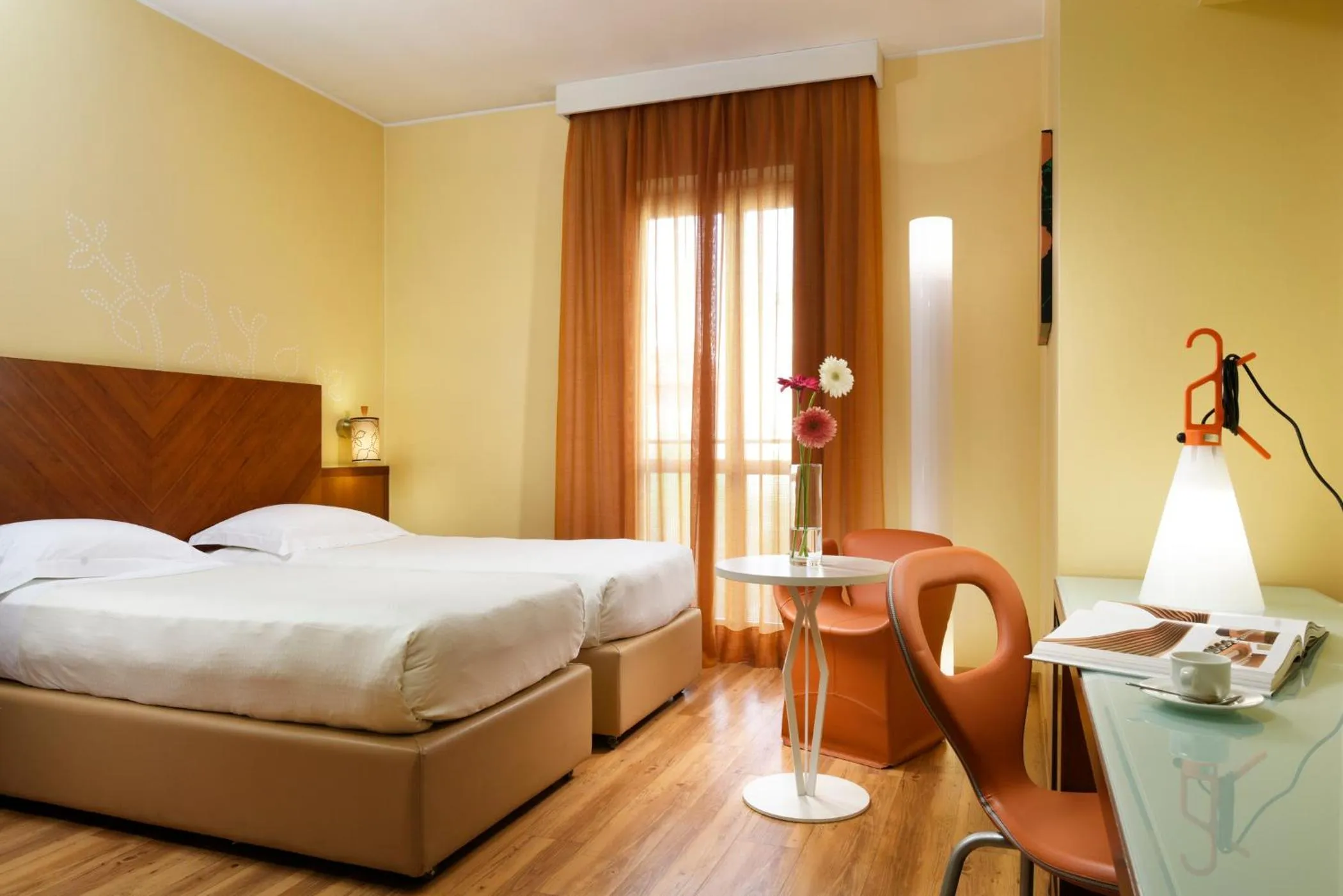 Bed in UNA Hotels Mediterraneo Milano